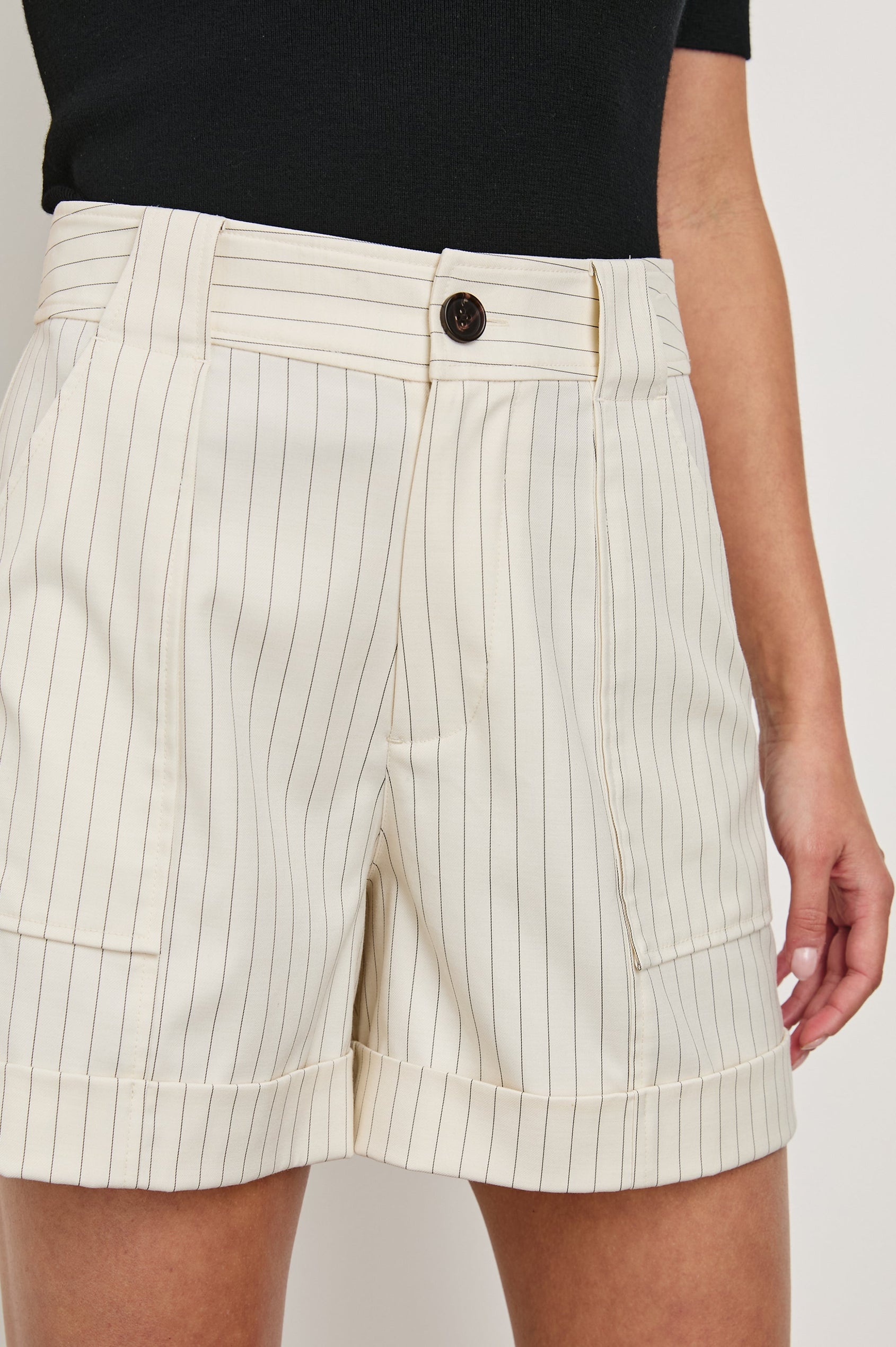 Maryam shorts with Cuffed Hems, Two Large Front Pockets, Two Back Patch Pockets, and Belt Loops in Birch Pinstripe Colorway, vertical stripes in grey and cream - Front View Featured on Model