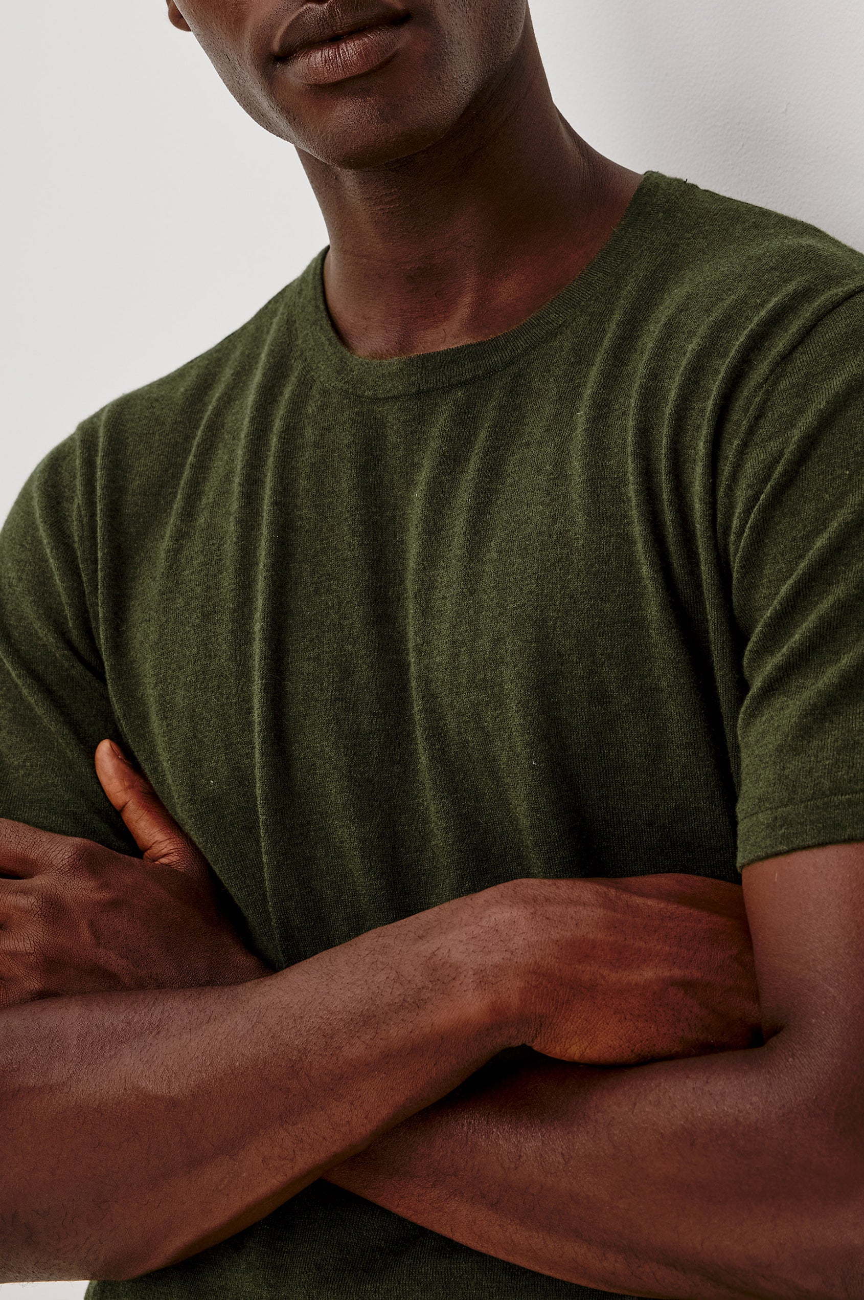 Mason Cotton Cashmere T-Shirt in Soft Cotton Cashmere Blend With Crew Neck, Short Sleeves, and Slim Fit in Hemlock Colorway - Upper Body Front View Featured on Model