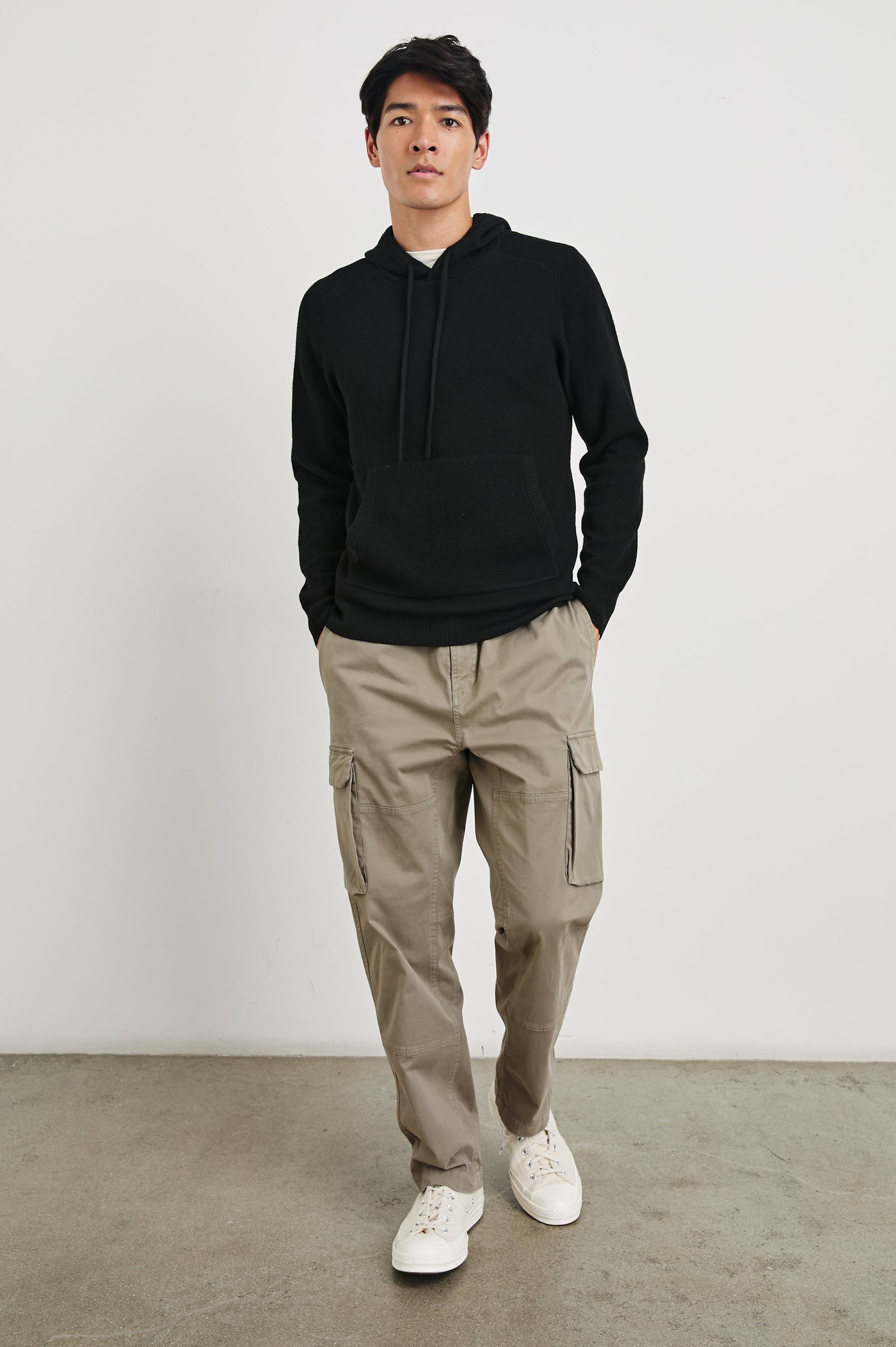 Matador Hoodie with Drawstring ties and a Kangaroo Pocket in Grey Heather Colorway - Front Full Body View Featured on Model