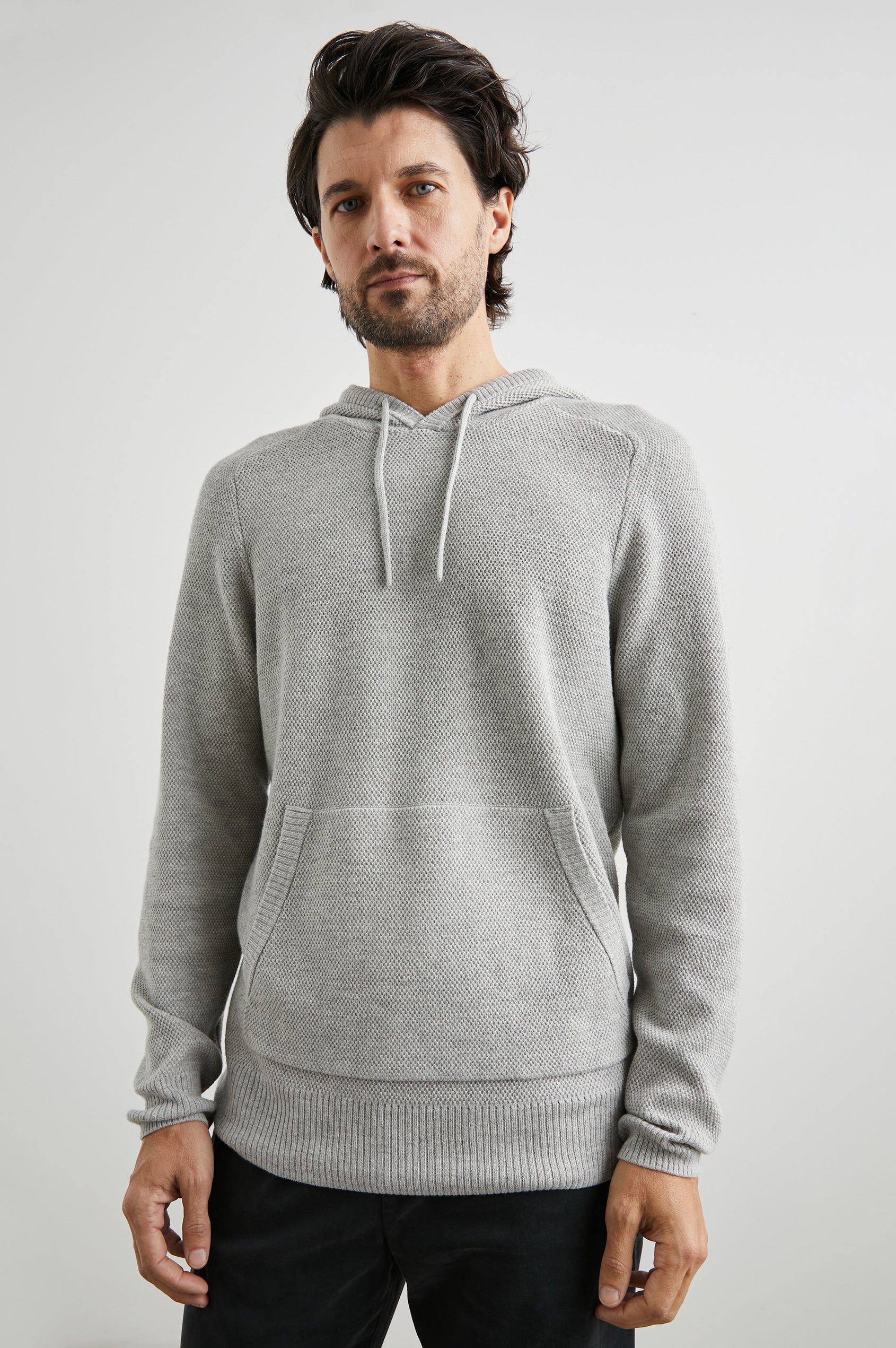 Matador Hoodie with Drawstring ties and a Kangaroo Pocket in Grey Heather Colorway - Front View Featured on Model