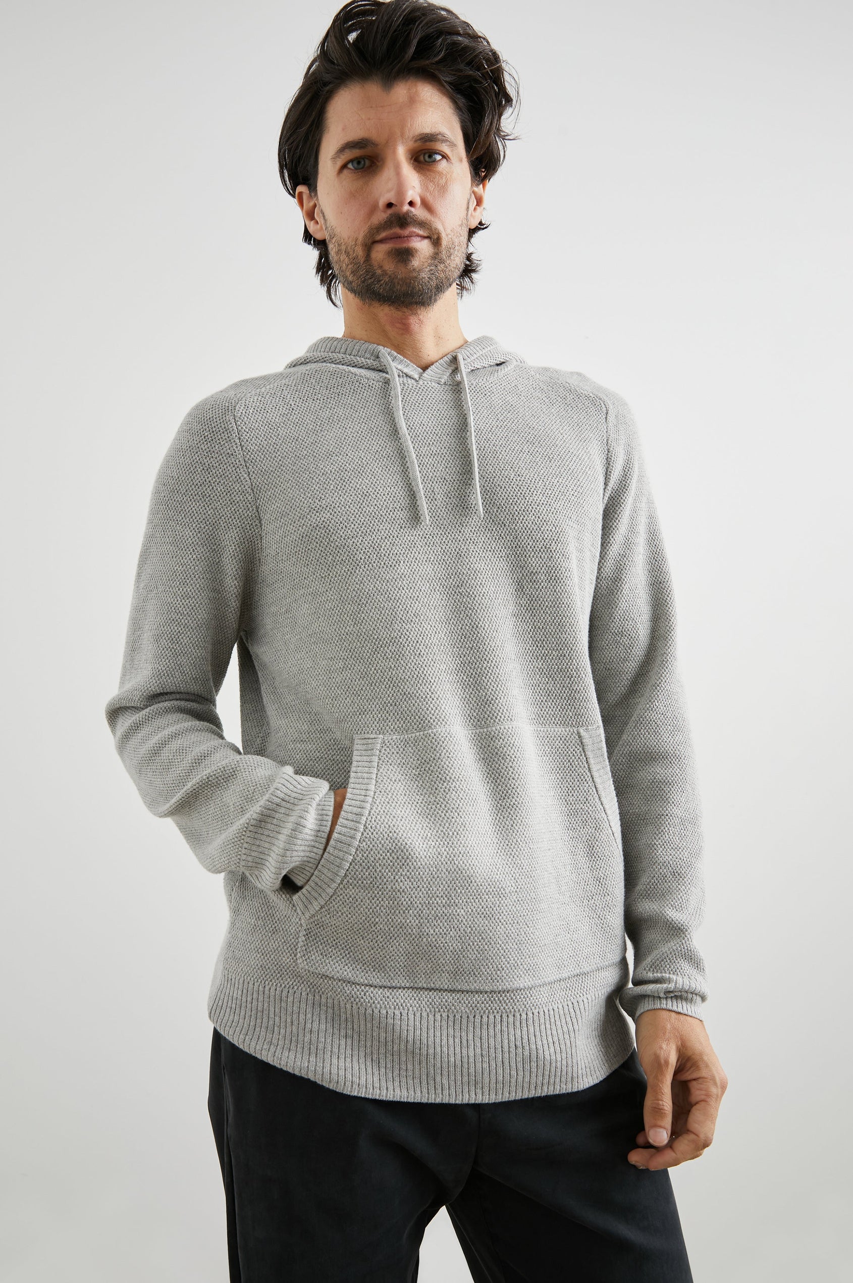 Matador Hoodie with Drawstring ties and a Kangaroo Pocket in Grey Heather Colorway - Front View Featured on Model