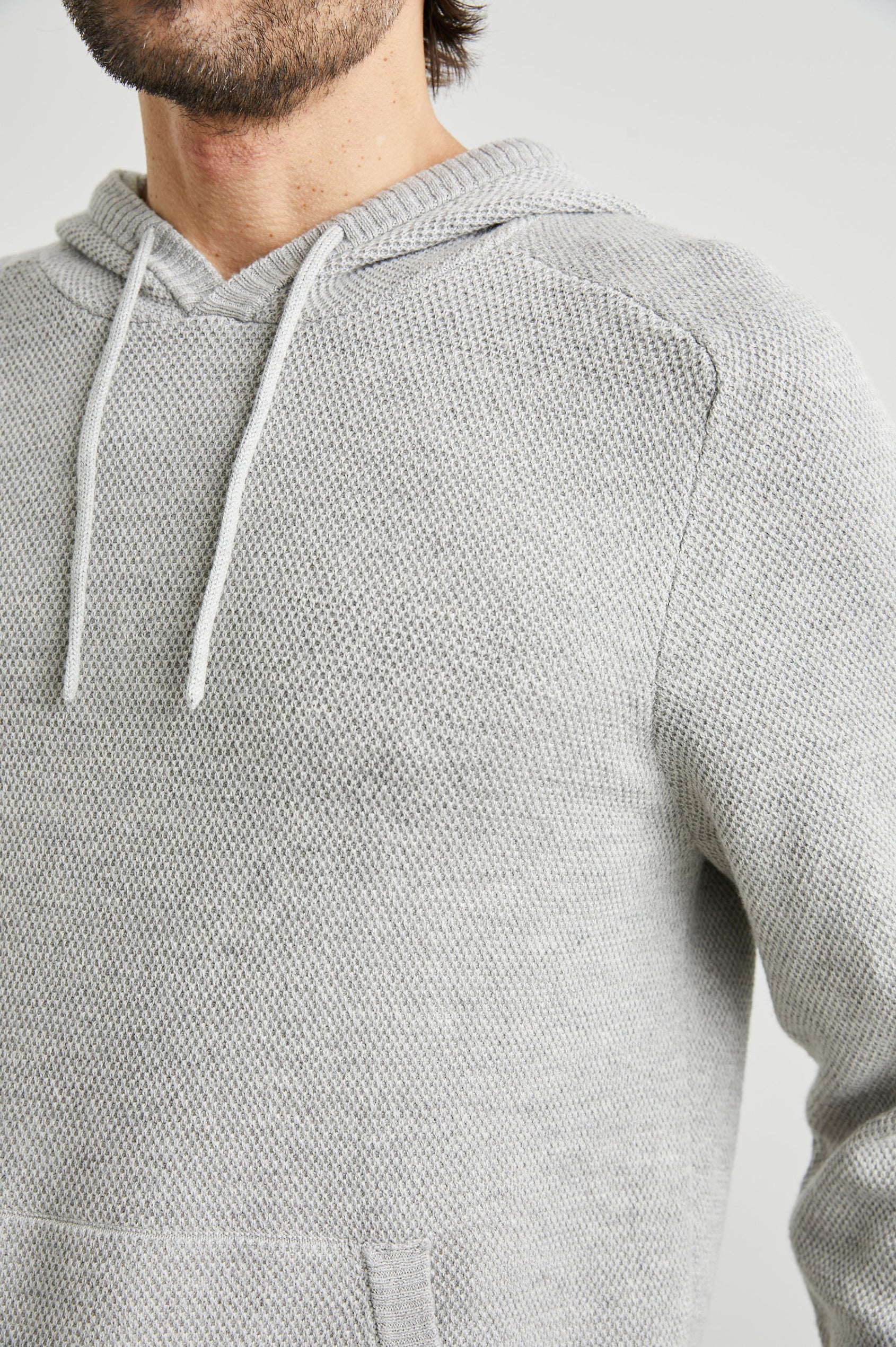 Matador Hoodie with Drawstring ties and a Kangaroo Pocket in Grey Heather Colorway - Front View Featured on Model