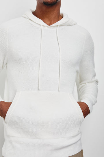 Matador Hoodie with Drawstring ties and a Kangaroo Pocket in White Colorway - Front View Featured on Model