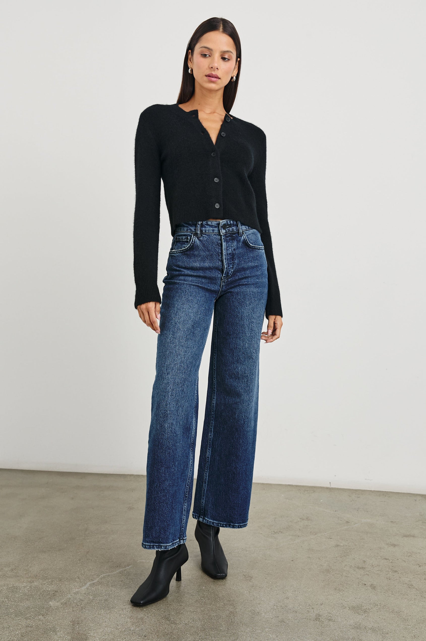 Matilda Cropped Long-Sleeve Sweater with Button Closure, Crew Neck and Ribbed Trim in Black Colorway - Front Full Body View Featured on Model