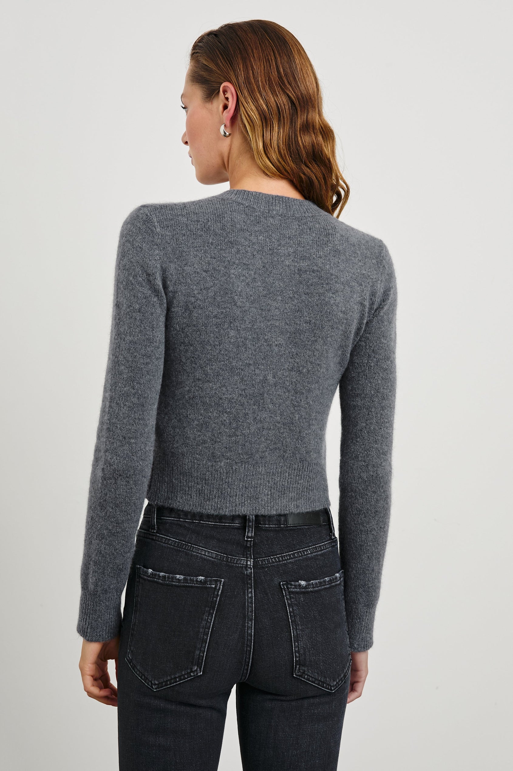 Matilda Cropped Long-Sleeve Sweater with Button Closure, Crew Neck and Ribbed Trim in Charcoal Colorway - Back View Featured on Model