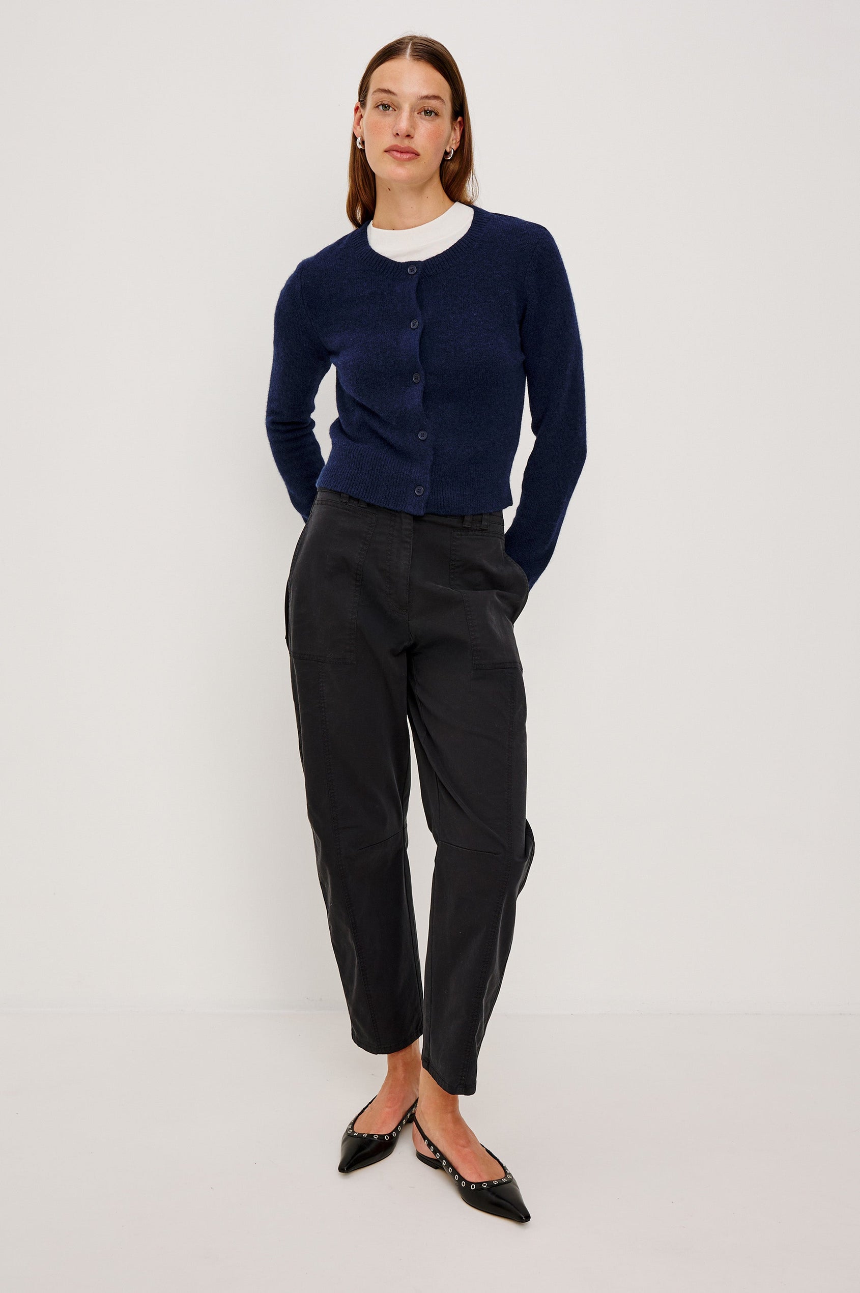 Matilda Cropped Long-Sleeve Sweater with Button Closure, Crew Neck and Ribbed Trim in Navy Colorway - Full Body Front View Featured on Model