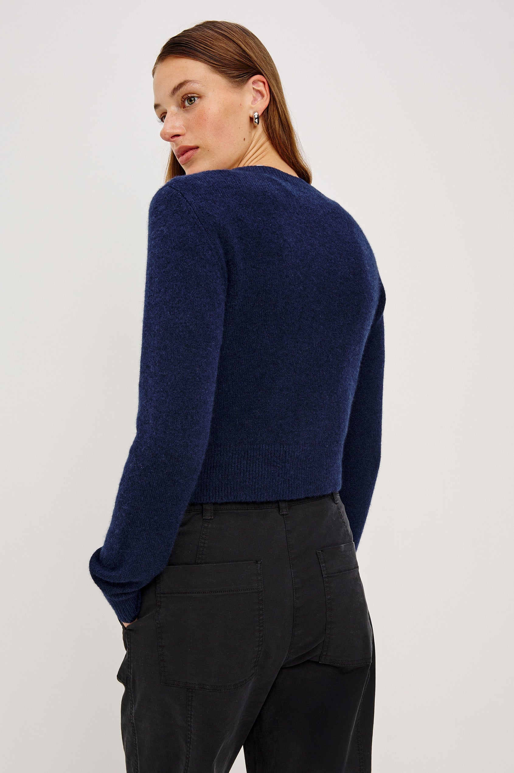 Matilda Cropped Long-Sleeve Sweater with Button Closure, Crew Neck and Ribbed Trim in Navy Colorway - Back View Featured on Model