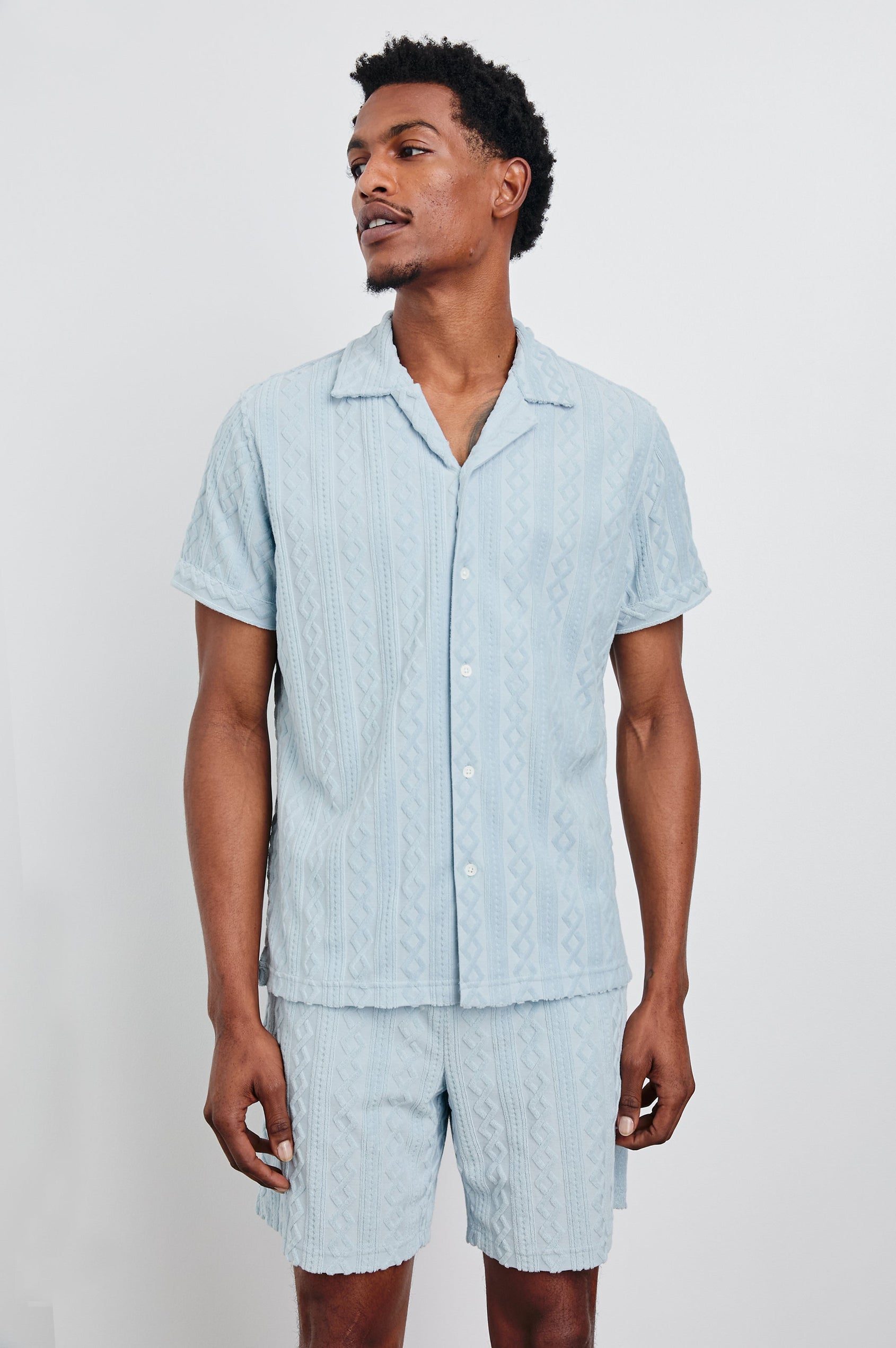 Maverick Short Sleeve Button Up with a raised jacquard pattern in Coastal Blue Colorway - Front View Featured on Model
