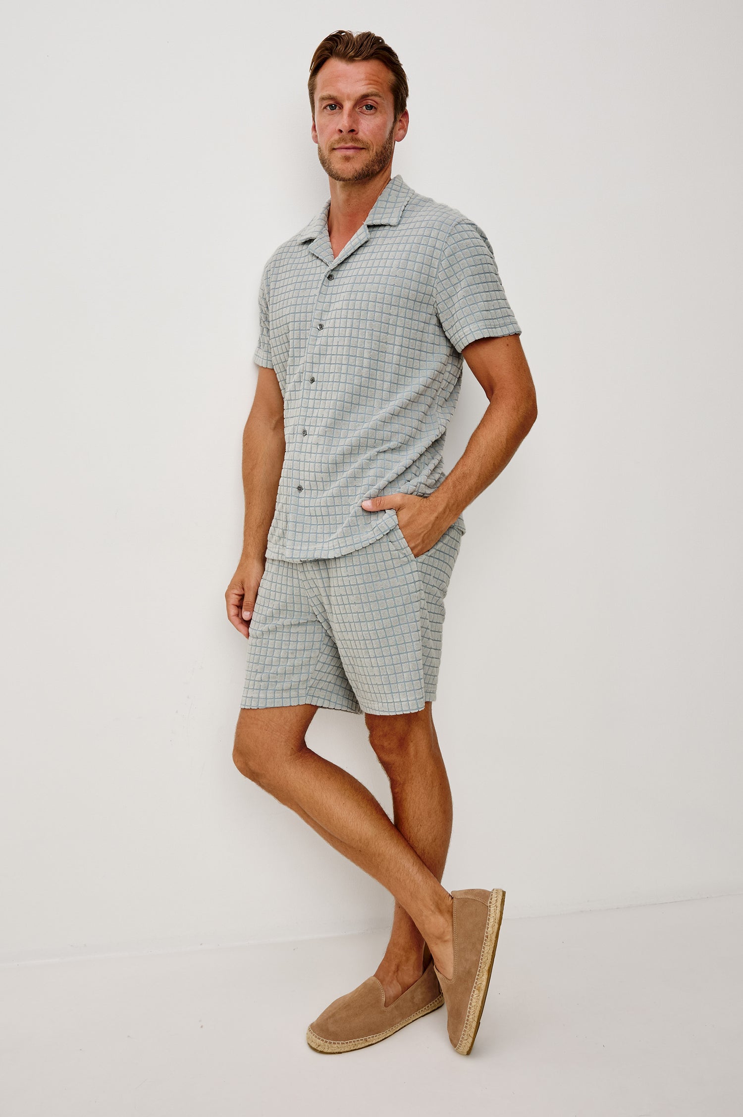Maverick Short Sleeve Shirt in French Terry With Jacquard Pattern, Notched Collar, Front Buttons, and Classic Fit in Silver Line Blue Grid Colorway - Full Body Front View Featured on Model