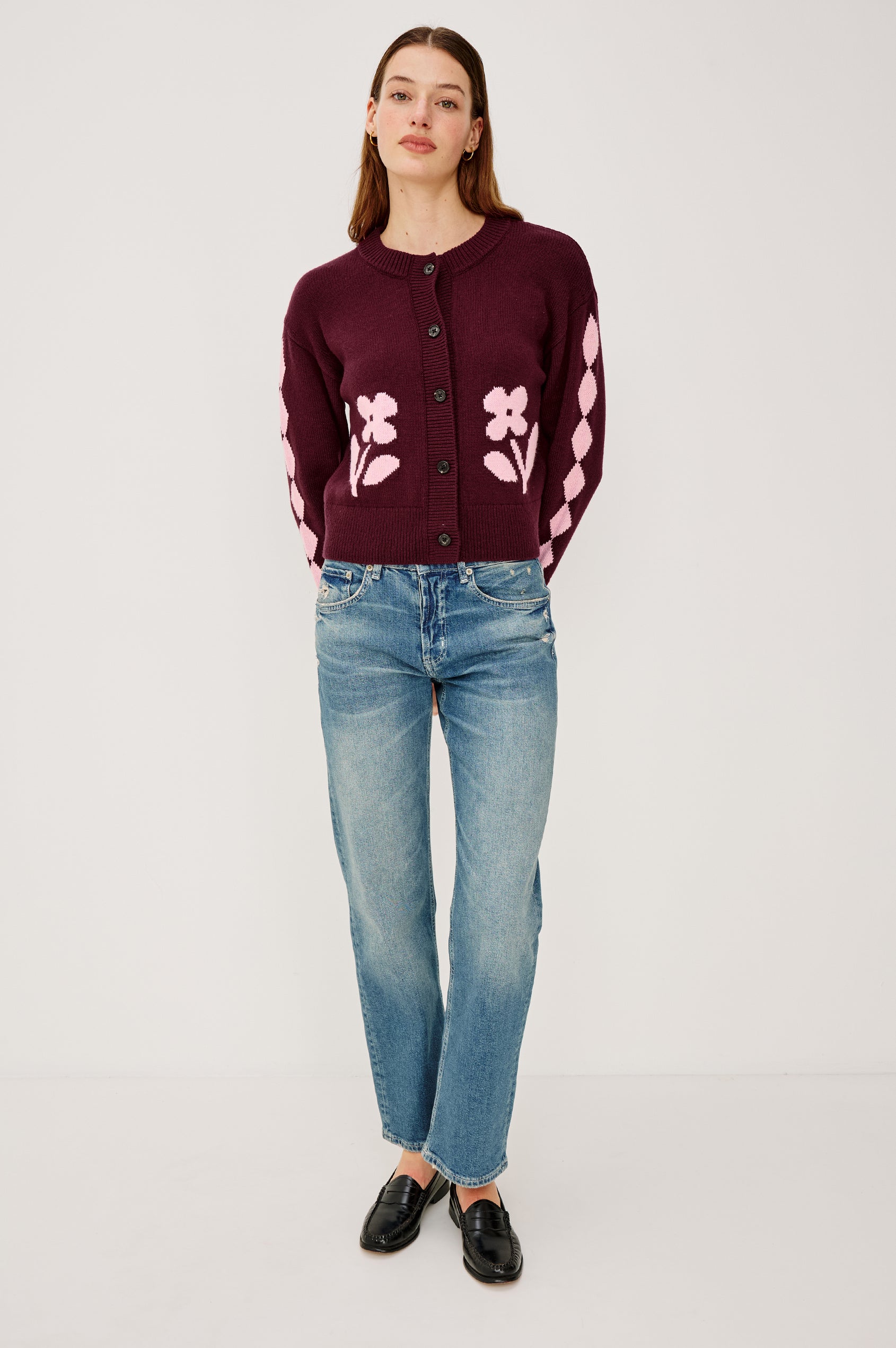 Mavie Long-Sleeve Cardigan with Button Closure, Crew Neck and Ribbed Trim in Garnet Daisy Colorway with Pink Flowers and Diamonds on Garnet - Front Full Body View Featured on Model