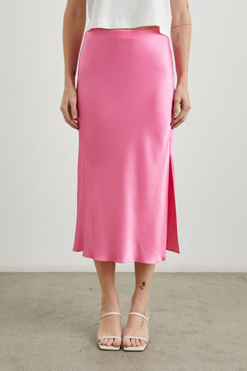 Maya Midi Skirt with Mid-Thigh Side Slit in Malibu Pink Colorway - Front View Featured on Model