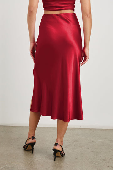 Maya Midi Skirt with Mid-Thigh Side Slit in Scarlet Colorway - Back View Featured on Model