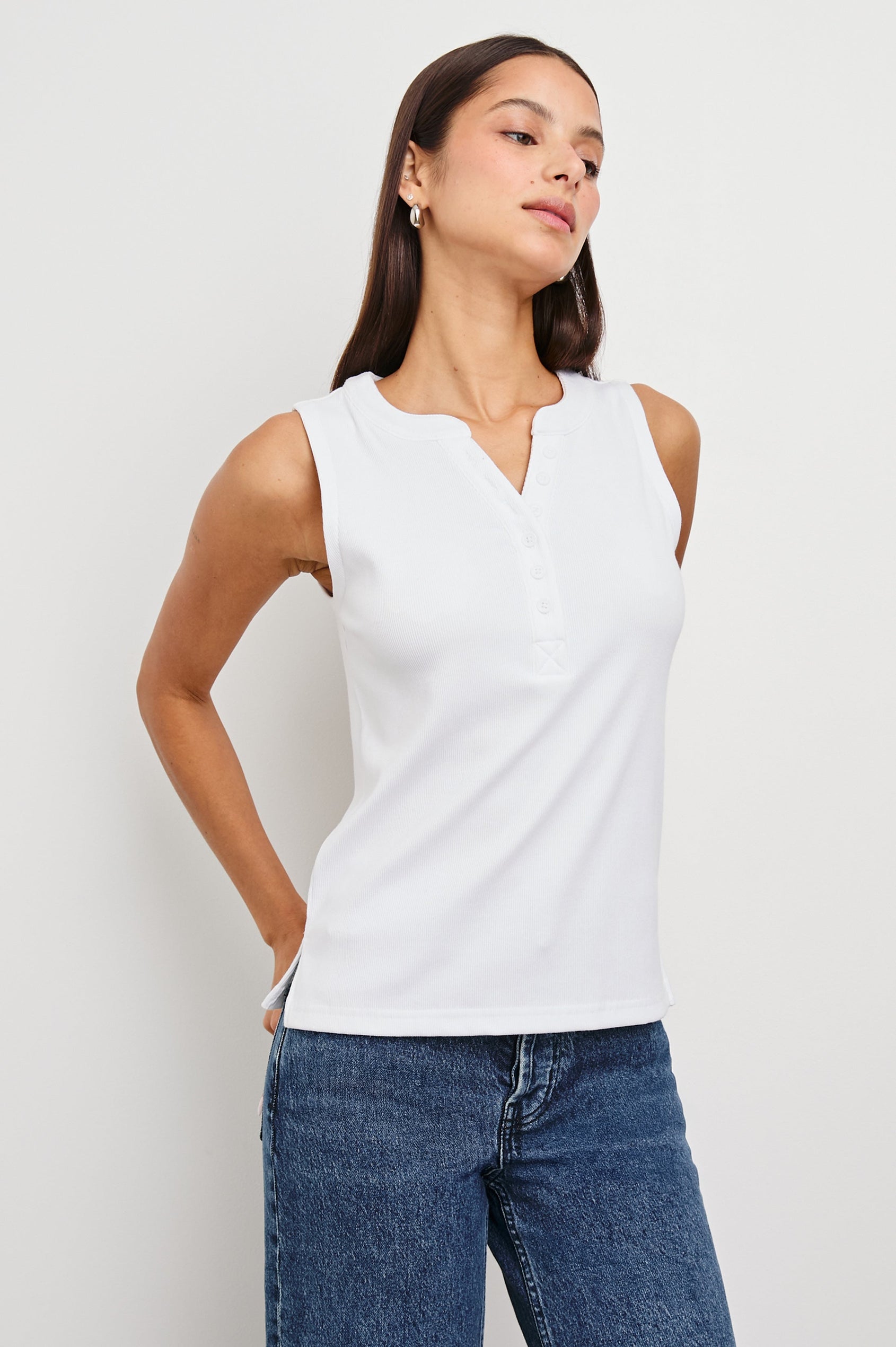Mayla Sleeveless Top With 3/4 Front Buttons In Colorway White - Side Angle View Featured On Model