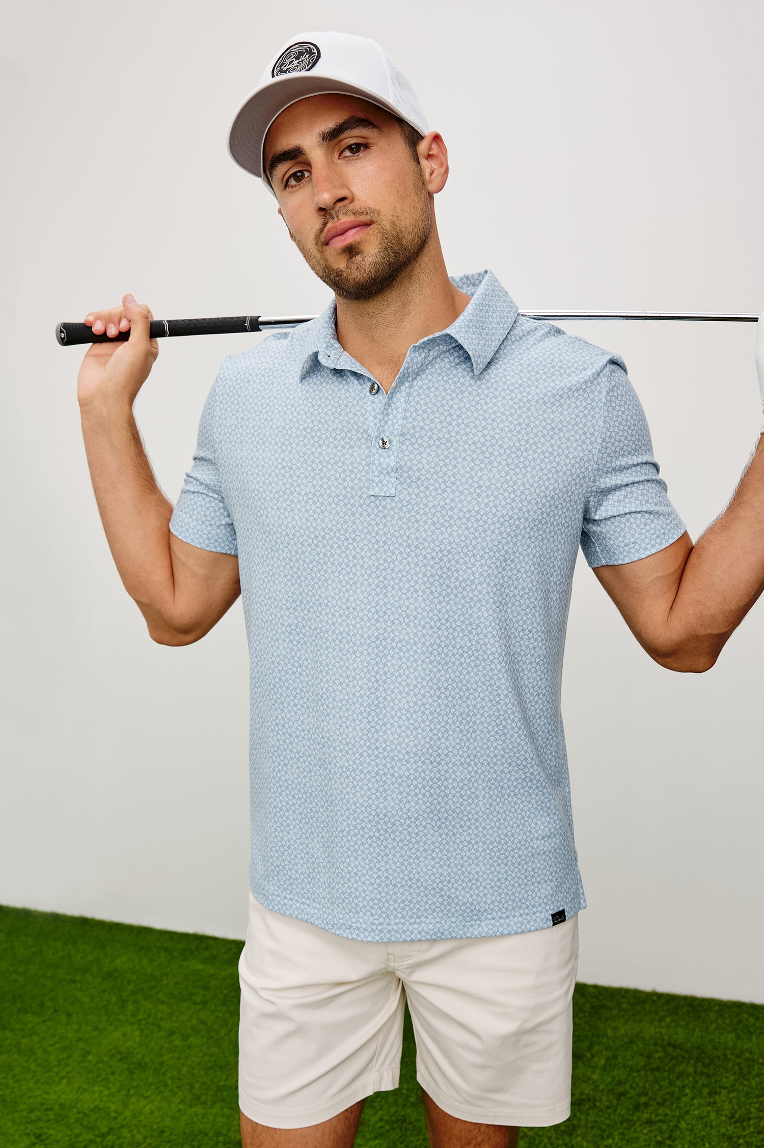 Merced Golf Polo in TENCEL™ Poly Blend With Collar, Quarter Placket, Short Sleeves, and Classic Fit in Cuyama Batik Glass Colorway - Upper Body Front View Featured on Model
