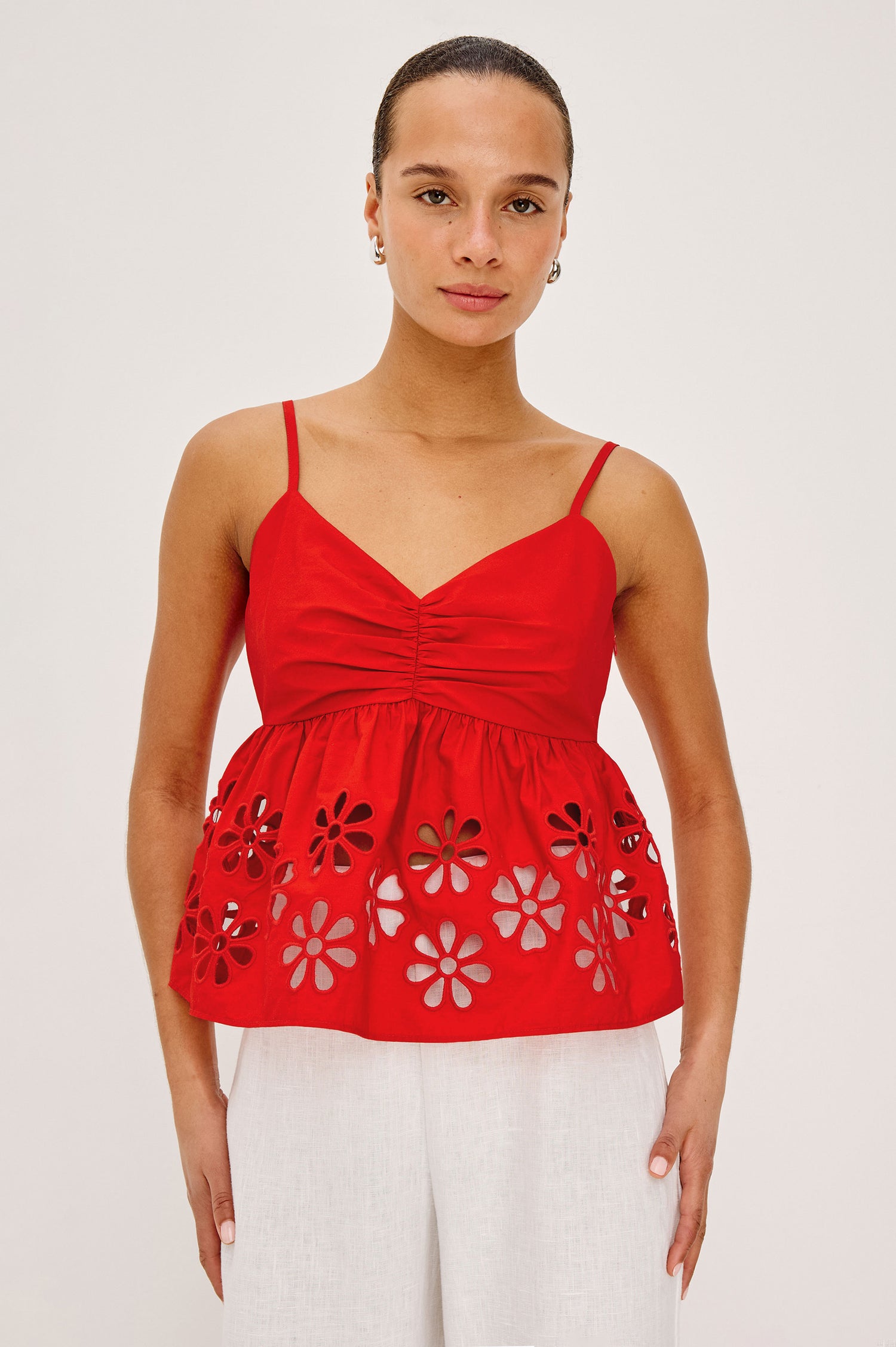 Meru Tank Top in Cotton Polin With Center Front Ruching, Peplum Embroidered Hem, and Smocked Back in Scarlet - Upper Body Front View Featured on Model