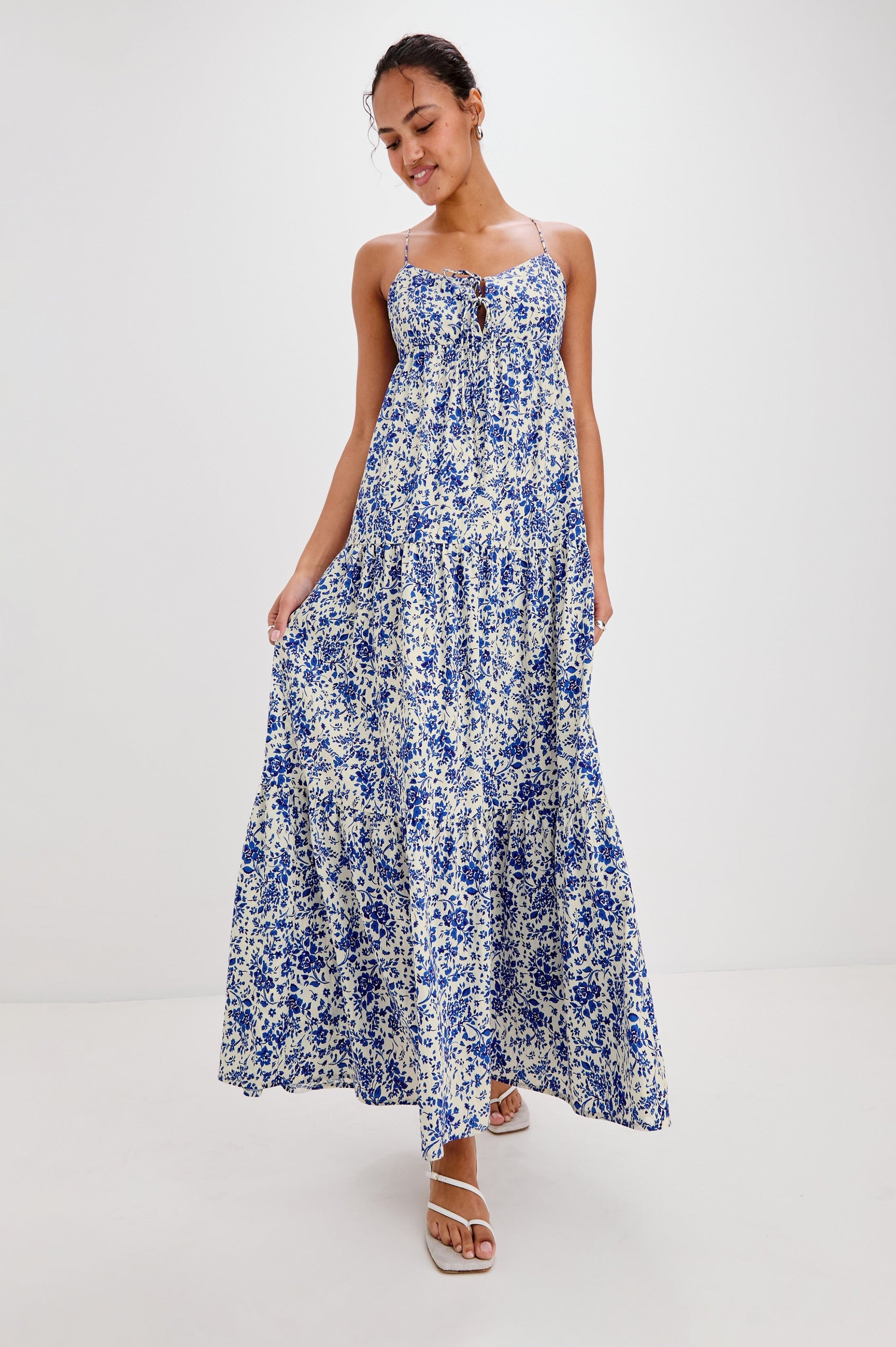 Mica Midi Tank Dress with Spaghetti Straps, a Keyhole at Center Front, Ties and a Tiered Skirt in Blue Marguerite Colorway. Front View Shown on Model.