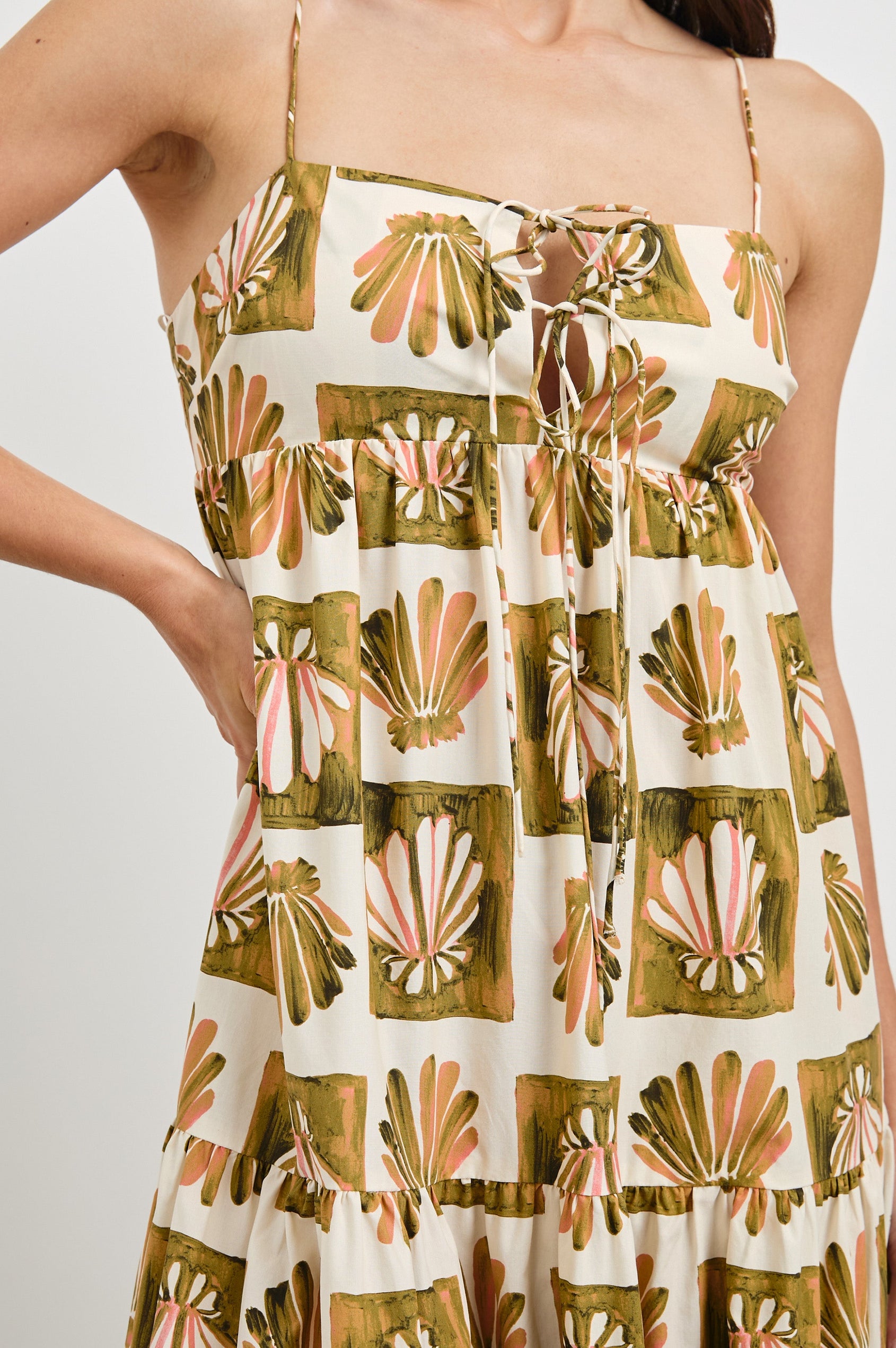 Mica Midi Tank Dress with and Empire Waist, Spaghetti Straps, a Keyhole at Center Front, Ties and a Tiered Skirt in Checkered Shells Colorway. Front View Shown on Model.