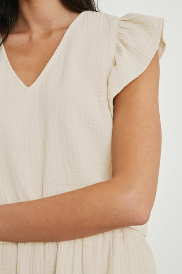 Miley Cropped, Short-Sleeve, V Neck Top with Flutter Sleeves and Textured Fabric in Flex Colorway - Front View Featured on Model