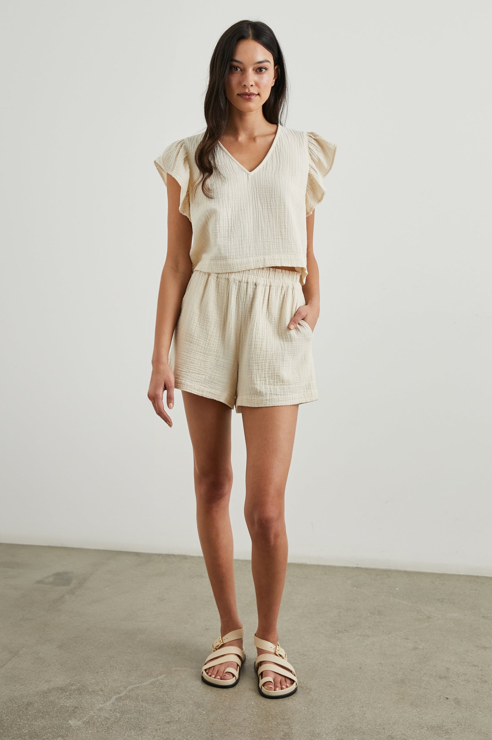 Miley Cropped, Short-Sleeve, V Neck Top with Flutter Sleeves and Textured Fabric in Flex Colorway - Front Full Body View Featured on Model