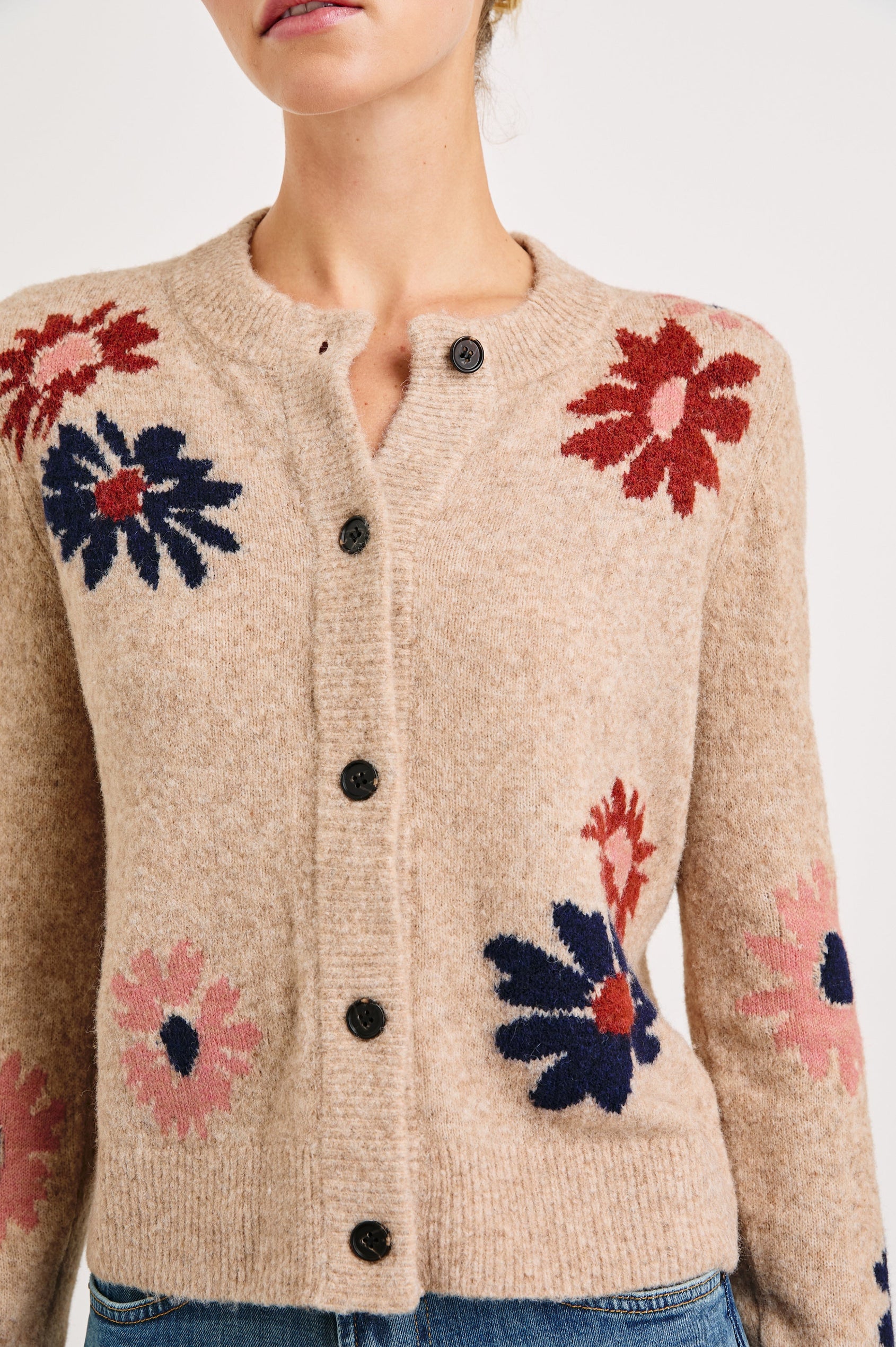Millie Long-Sleeve Sweater with Front Button Closure, a Crew Neck and Ribbed Trim in Mauve Meadow Colorway, Flowers in Pink, Navy and Red on Oatmeal - Front View Featured on Model 