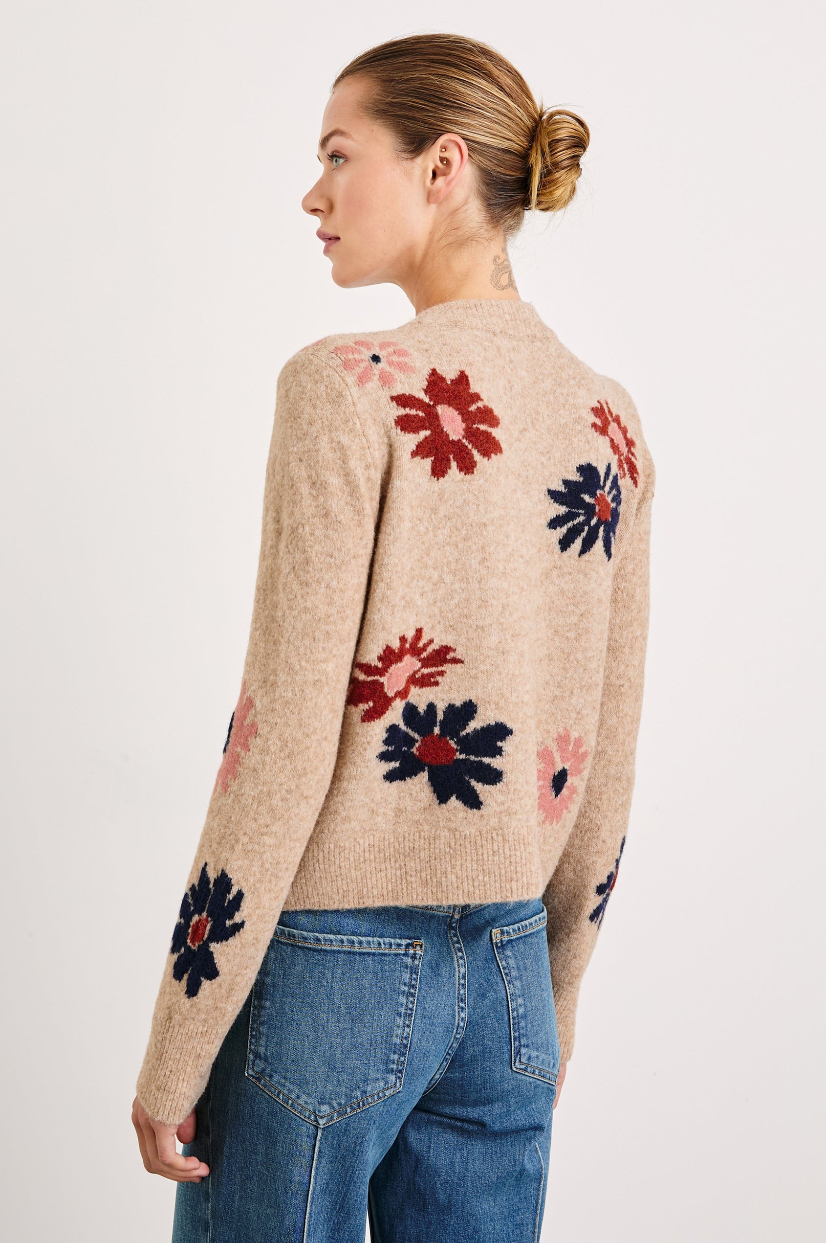 Millie Long-Sleeve Sweater with Front Button Closure, a Crew Neck and Ribbed Trim in Mauve Meadow Colorway, Flowers in Pink, Navy and Red on Oatmeal - Back View Featured on Model 