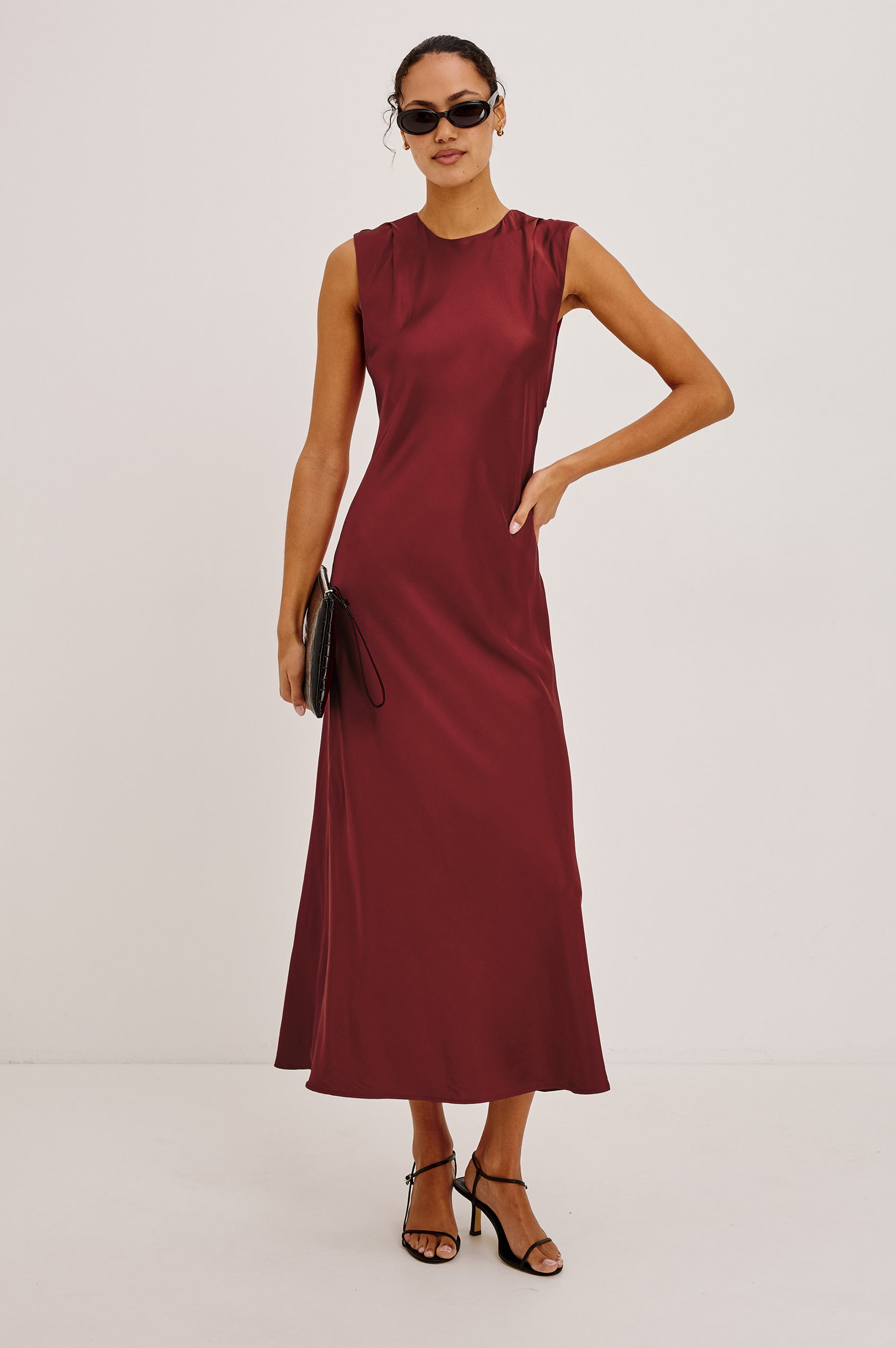 Mira Maxi Dress Bias Cut in Satin-Back Crepe With Crew Neckline, Pleated Shoulders, Side Zipper, and Keyhole Back With Button-Loop Closure in Crimson Colorway - Full Body Front View Featured on Model