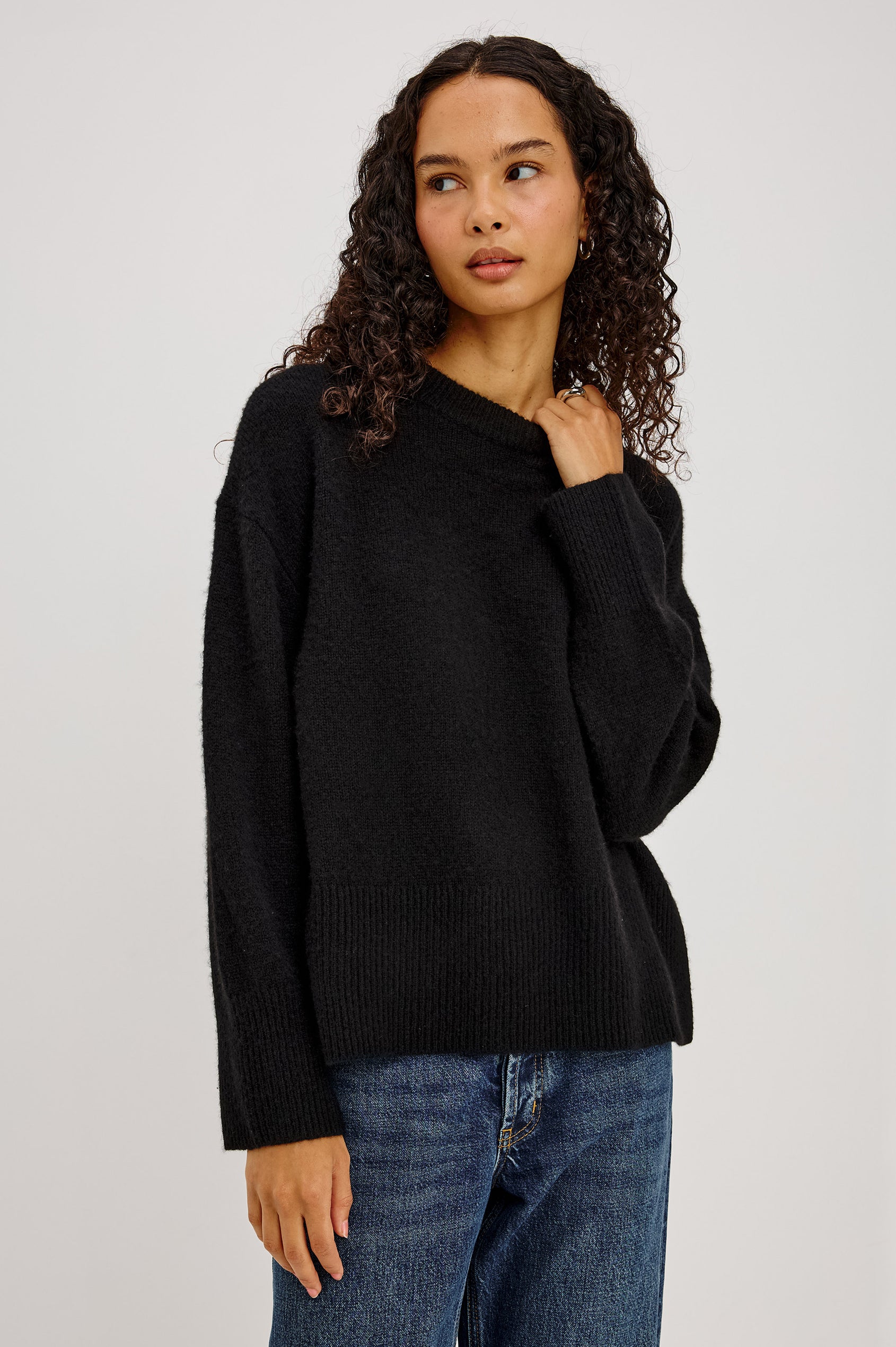 Giovanna Top in Soft Pointelle Cotton With Scoop Neck, Scalloped Trim, Ruffled Flutter Sleeves in Black Colorway - Upper Body Front View Featured on Model