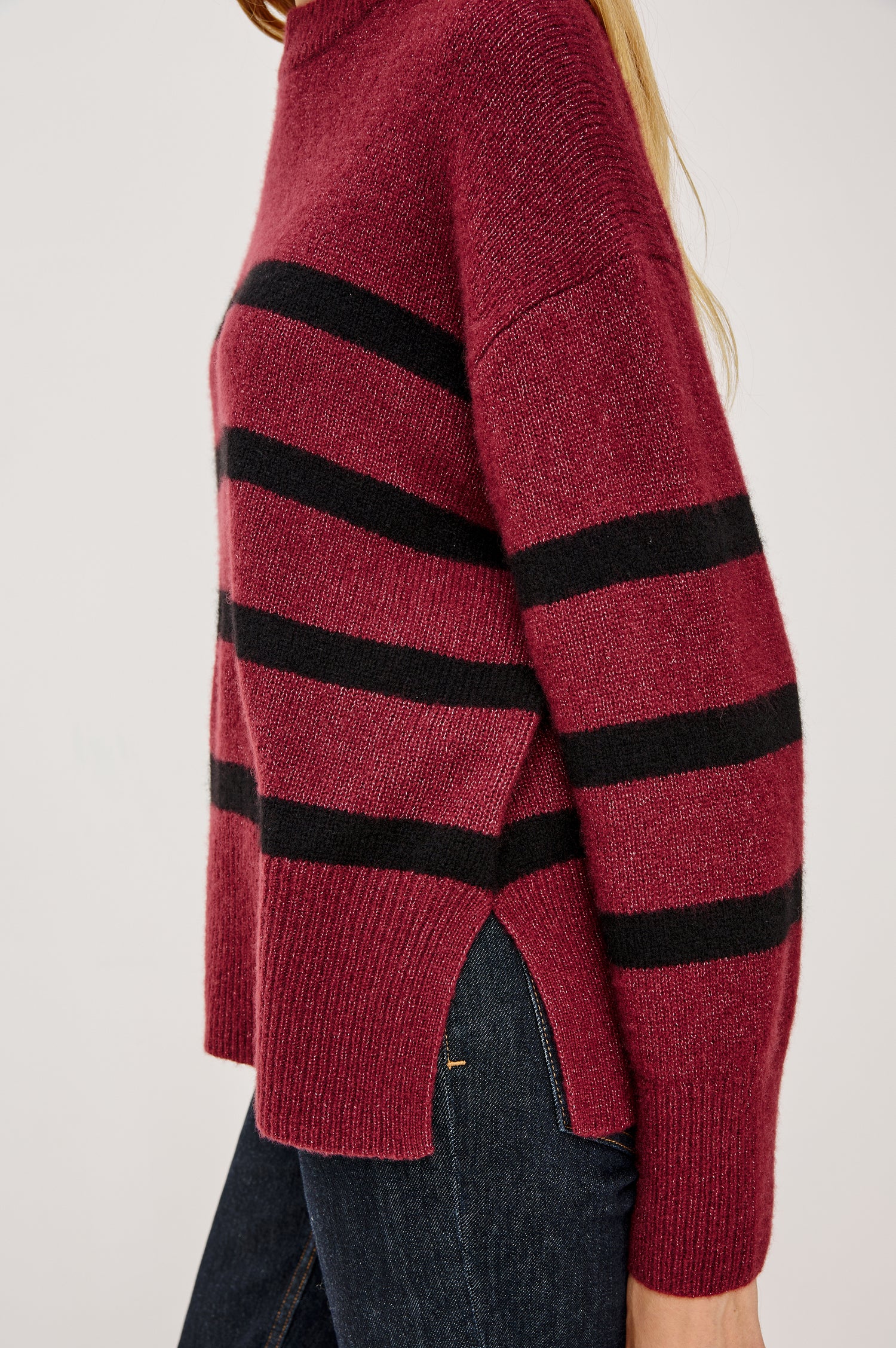 Miranda Sweater in Cashmere-Silk Blend With Crew Neckline, Ribbed Trim, Dropped Shoulders, Loose Relaxed Fit, and Long Sleeves in Garnet Black Stripe Colorway - Mid Body Side View Featured on Model