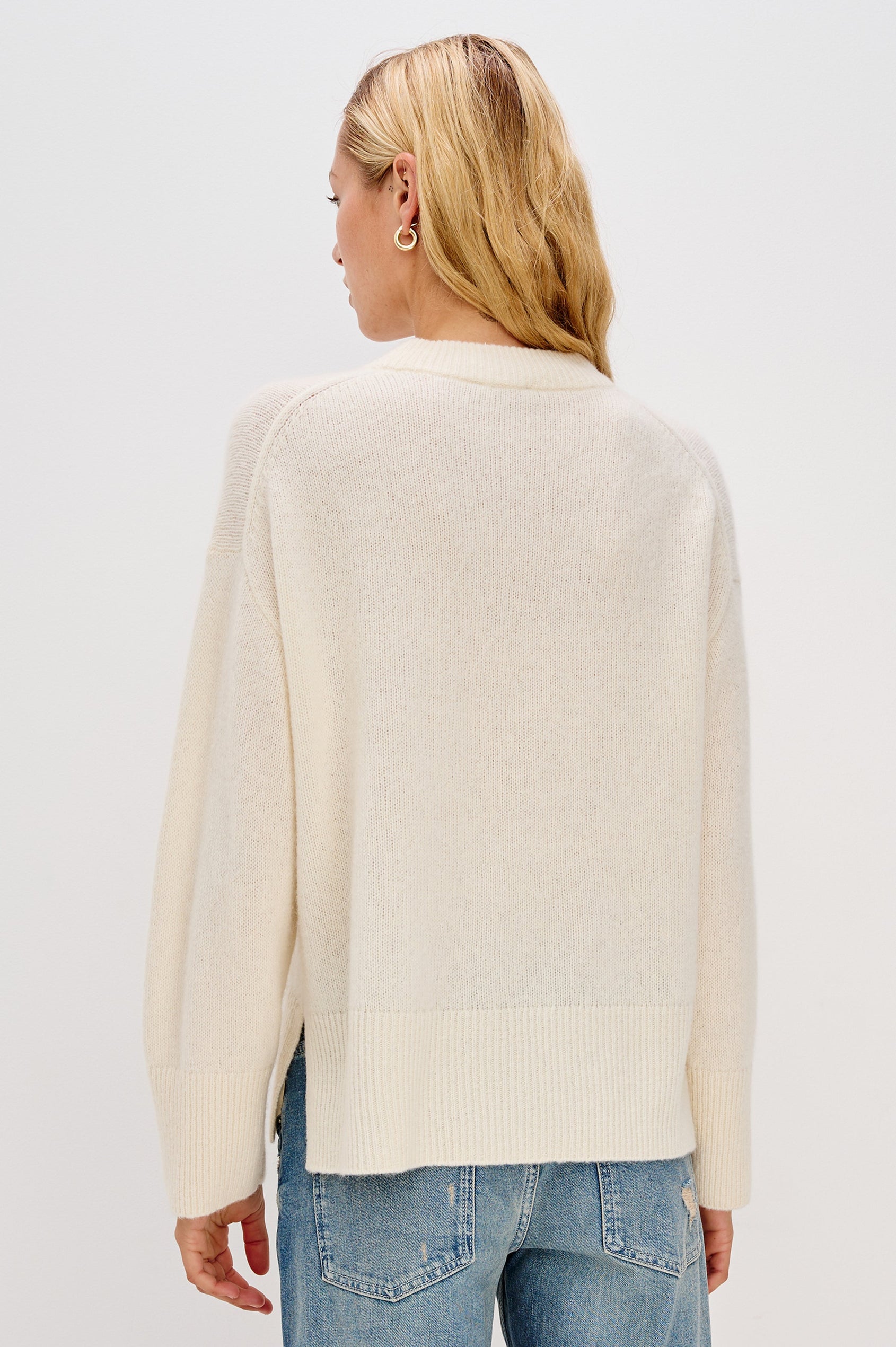 Miranda Long-Sleeve Sweater with a Mock Neck, Side Slits, and Ribbed Trim in Ivory Colorway - Back View Featured on Model