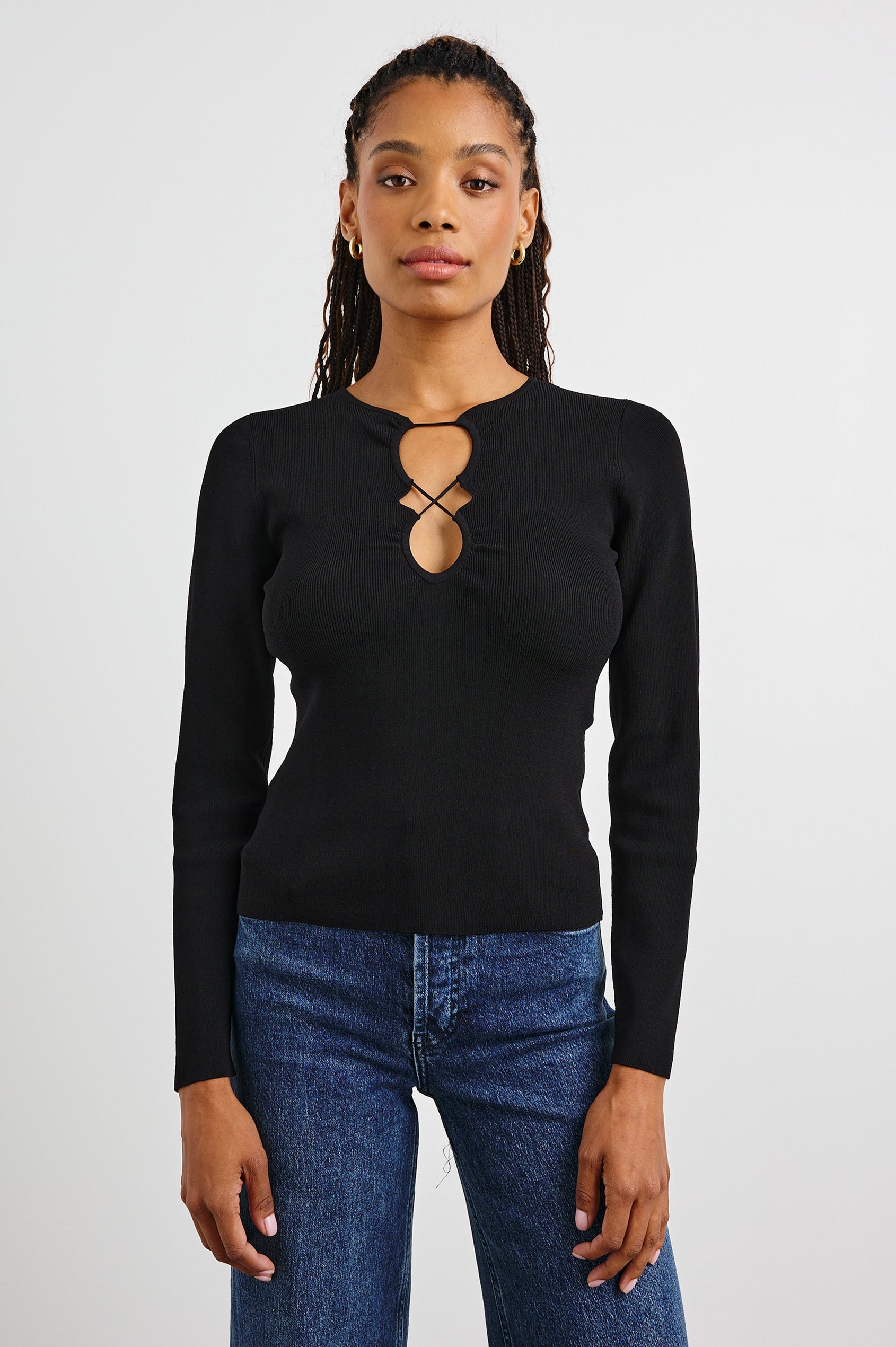 Misa Long-Sleeve Top with a Deep Geometric Cutout in Black Colorway - Front View Featured on Model 