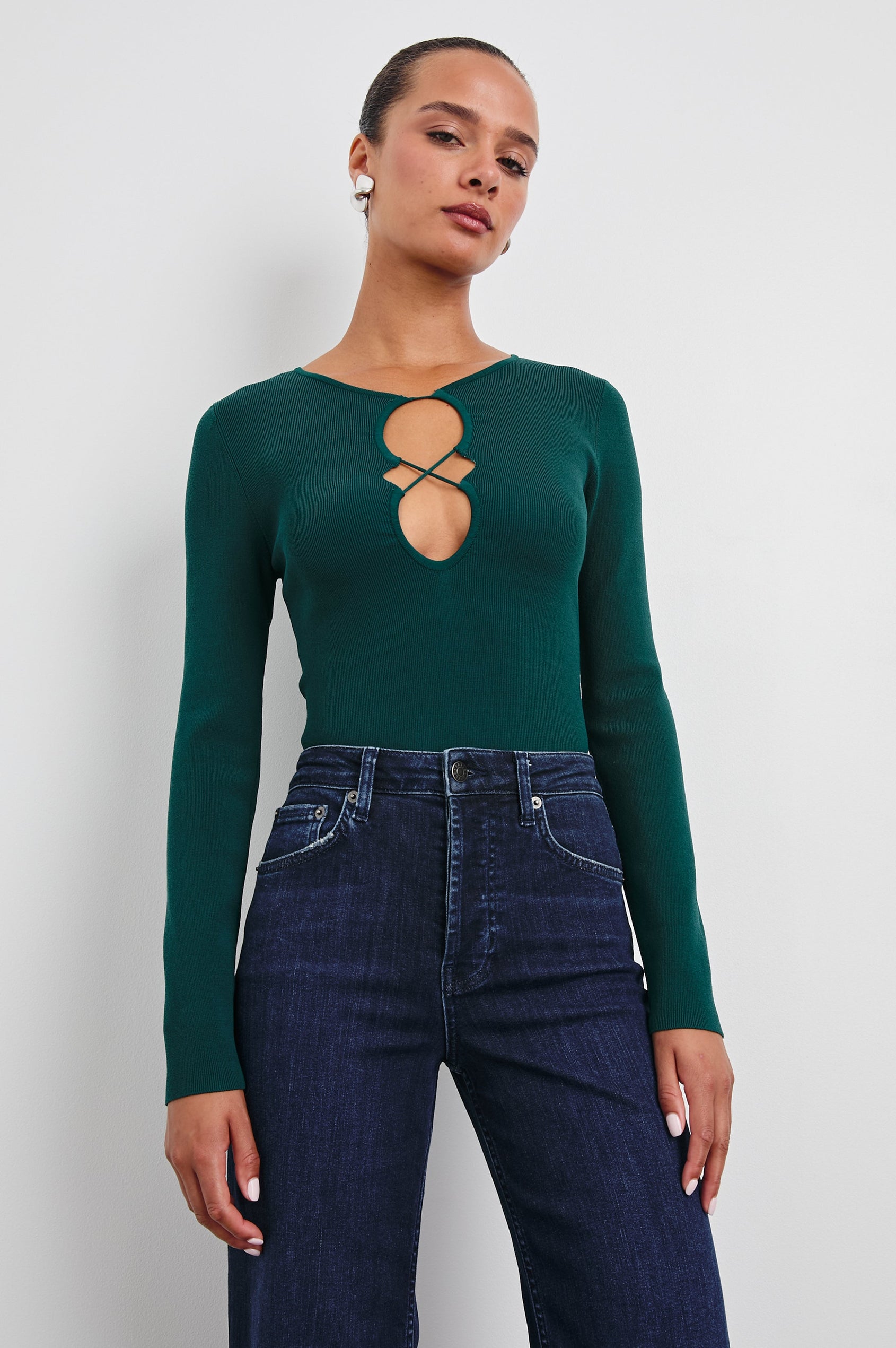 Misa Long-Sleeve Top with a Deep Geometric Cutout in Evergreen Colorway - Front Tucked View Featured on Model 