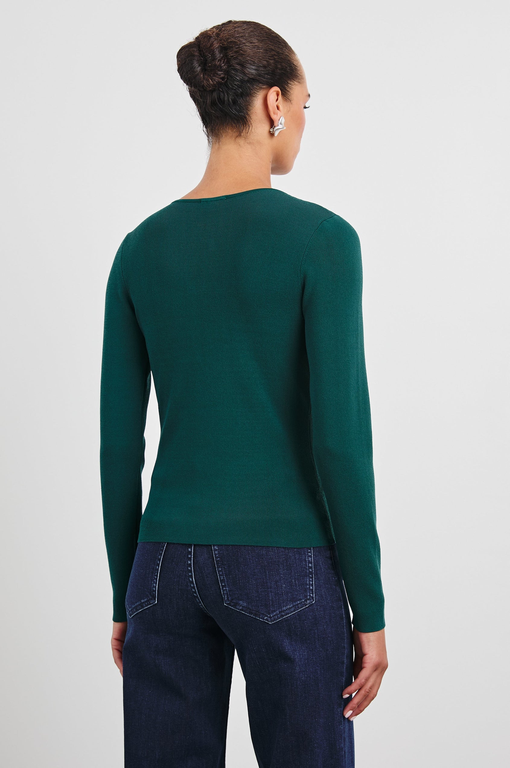 Misa Long-Sleeve Top with a Deep Geometric Cutout in Evergreen Colorway - Back View Featured on Model 