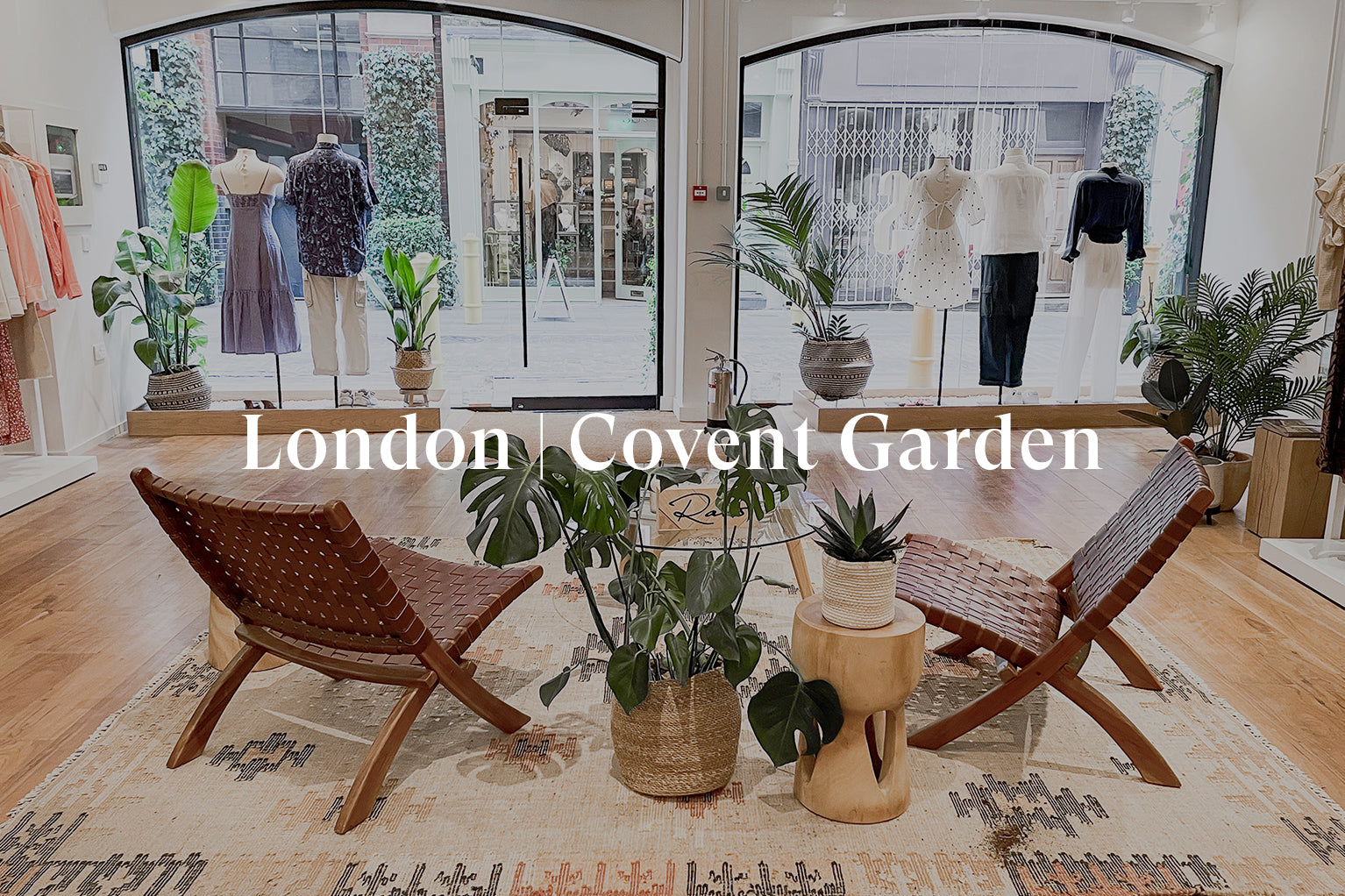 INSIDE OF LONDON COVENT GARDEN STORE SHOWING TWO CHAIRS IN THE CENTER OF THE ROOM