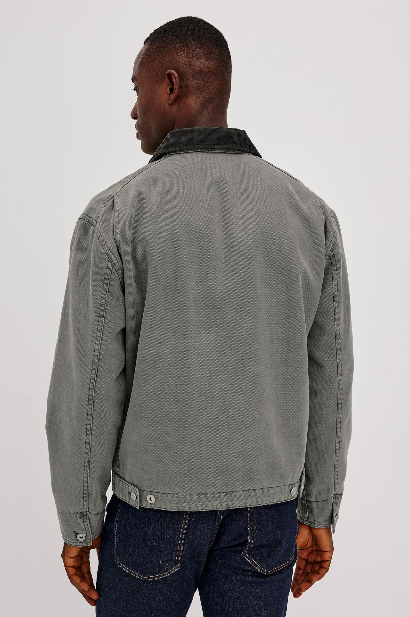Morro Workwear Utility Jacket in Heavy Cotton Canvas Duck With Corduroy Collar, Chest Zip Pocket, Side Welt Pockets, and Custom Dobby Lining in Graphite Colorway - Upper Body Back View Featured on Model