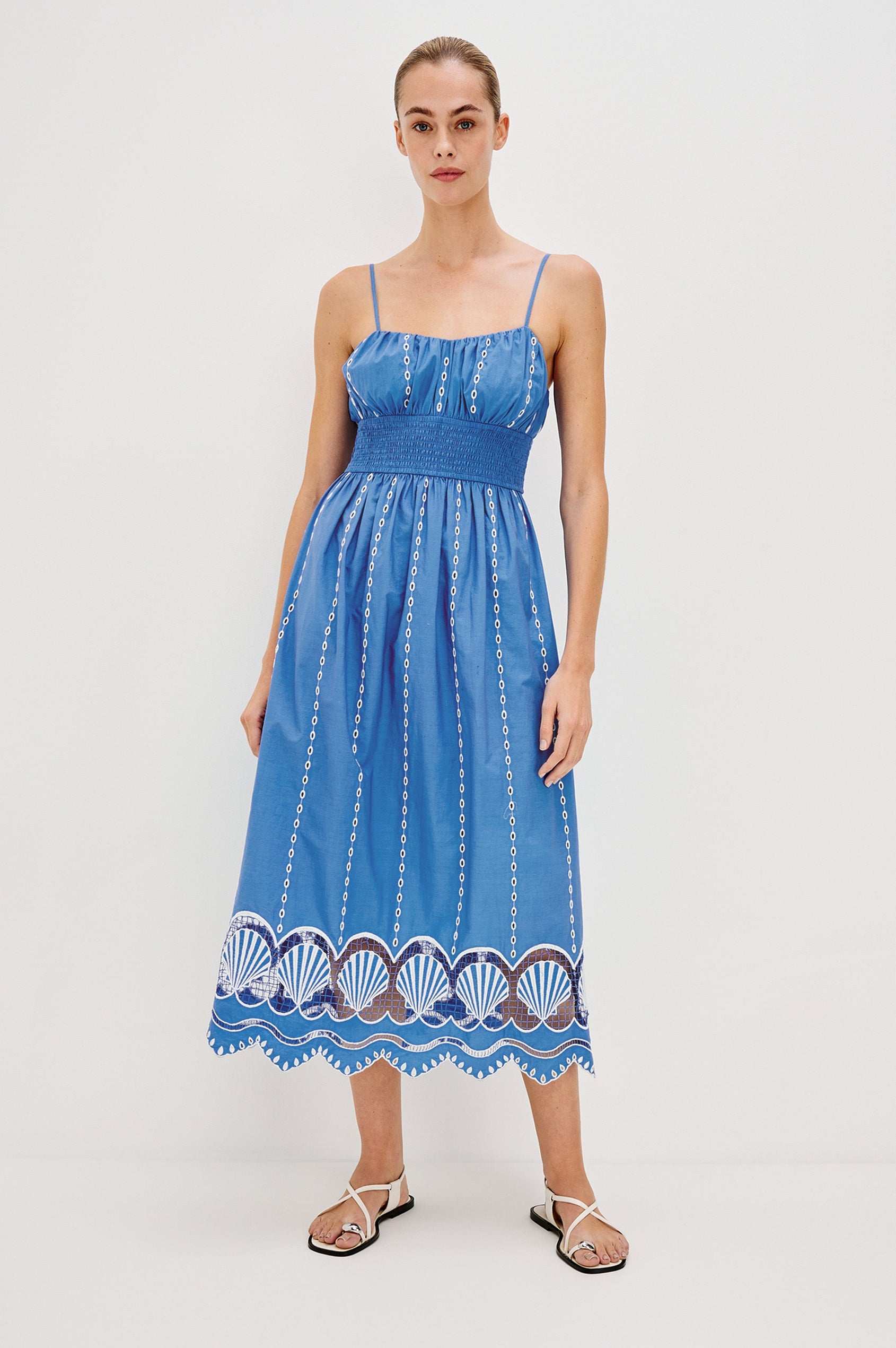 Murano Midi Tank Dress with Spaghetti Straps, Gathered Elastic Waistband, Sea Shell Embroidery and Scalloped Hem in French Blue Colorway. Full Body Front View Shown on Model.