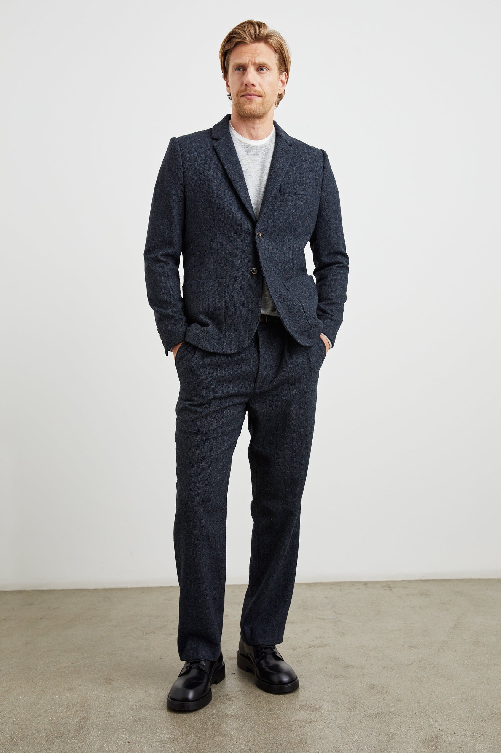 Murphy Pants with Pleats at the Waist, Belt Loops, Two Front Pockets and Two Button Welt Back Pockets in Celestial Tweed Colorway - Front Full Body View Featured on Model