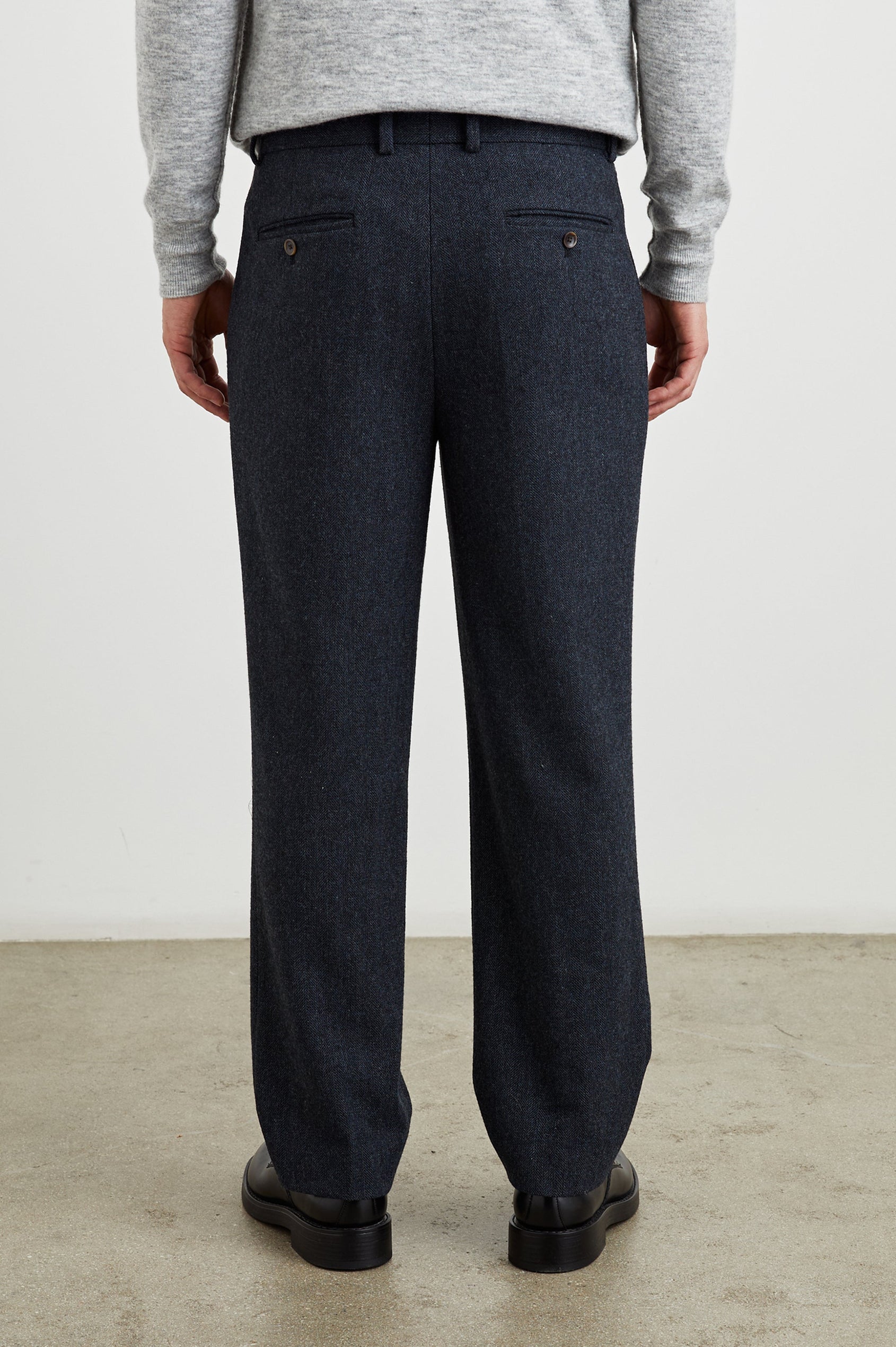 Murphy Pants with Pleats at the Waist, Belt Loops, Two Front Pockets and Two Button Welt Back Pockets in Celestial Tweed Colorway - Back View Featured on Model