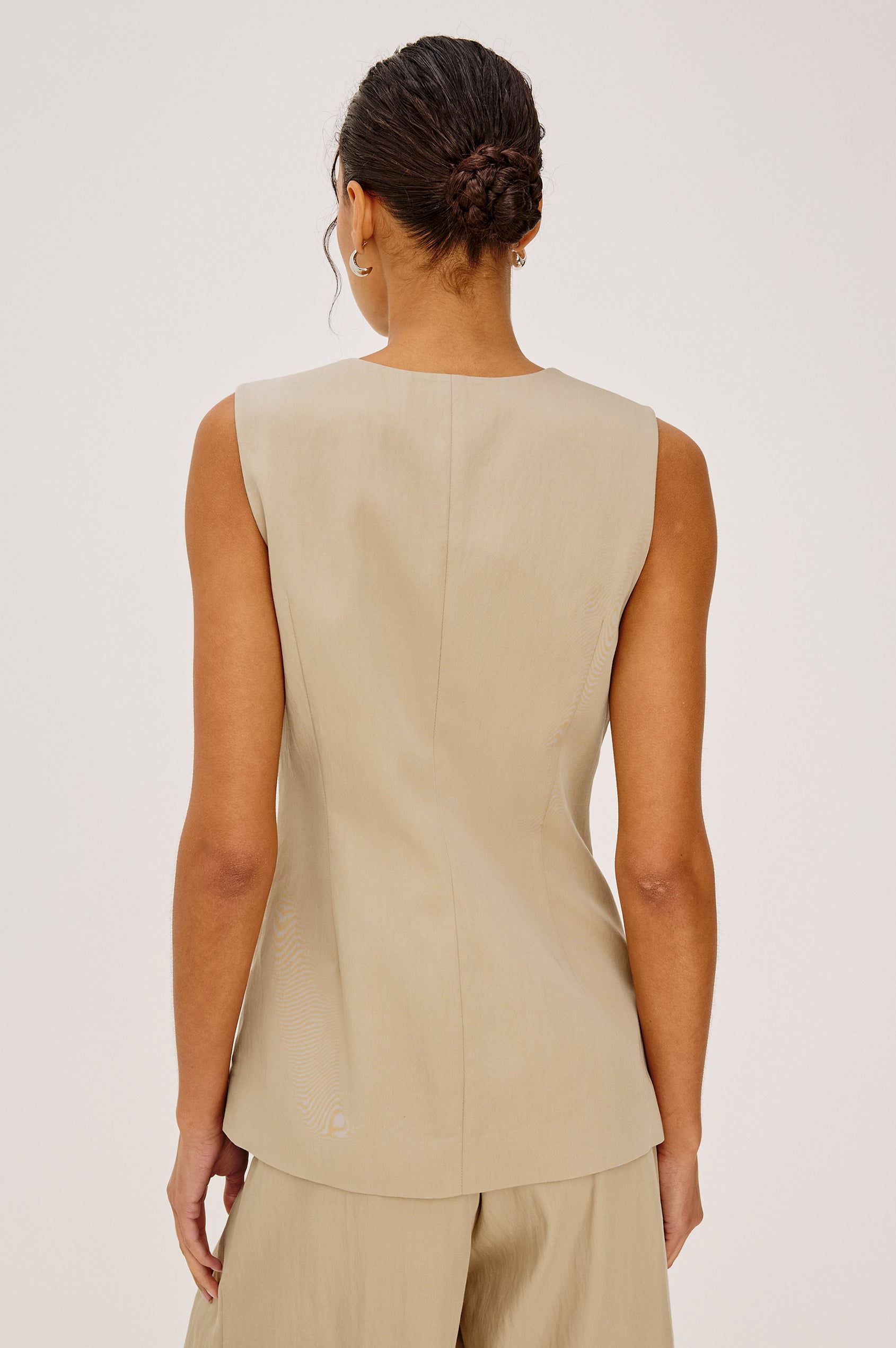 Mylah Vest in Viscose Suiting With V-Neckline, Front Buttons, and Slightly-Loose Fit Tapered at Waist in Almond Colorway - Upper Body Back View Featured on Model