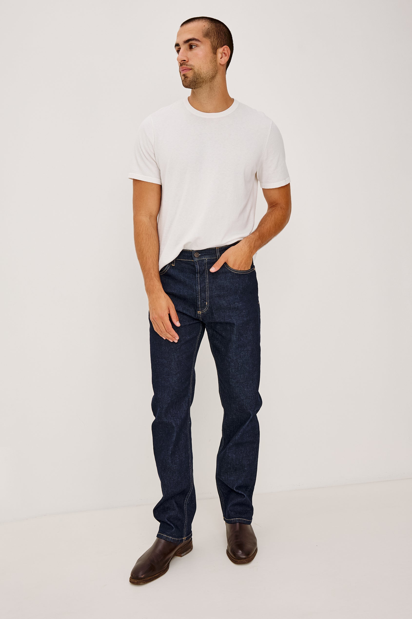 Nash Straight Leg Jean in Comfort Strech Denim With 5-Pockets and Front Zip Fly in Rinse Wash Colorway - Full Body Front View Featured on Model