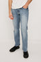 Nash is a straight leg 5-Pocket denim jean a zip fly and button closure as well as rivets in a Medium Vintage Wash. Front view featured on model.