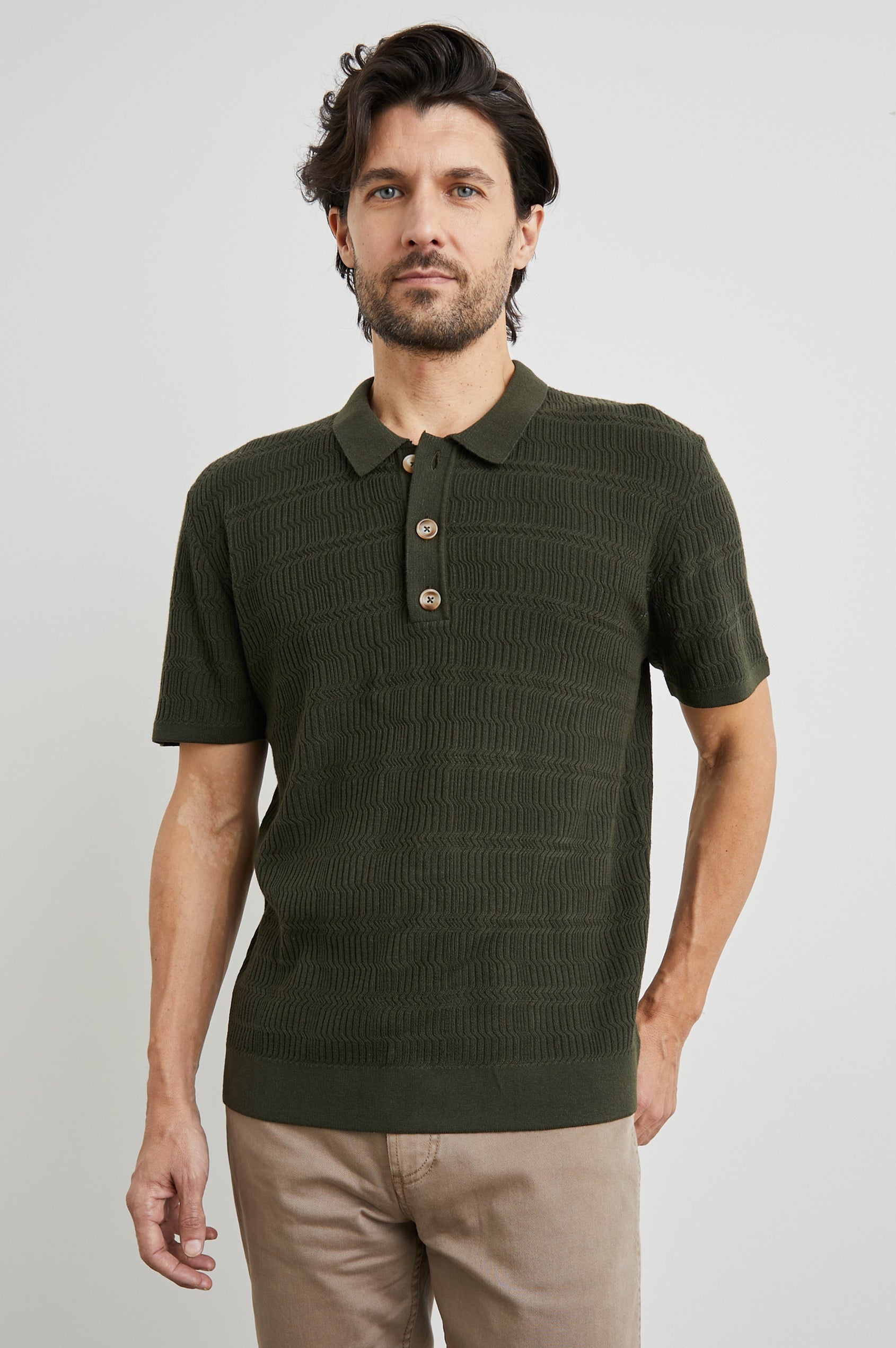 Nathan Short-Sleeve Polo Shirt with a Three-Button Placket and a Jacquard Pattern in Ancient Olive Colorway - Front View Featured on Model
