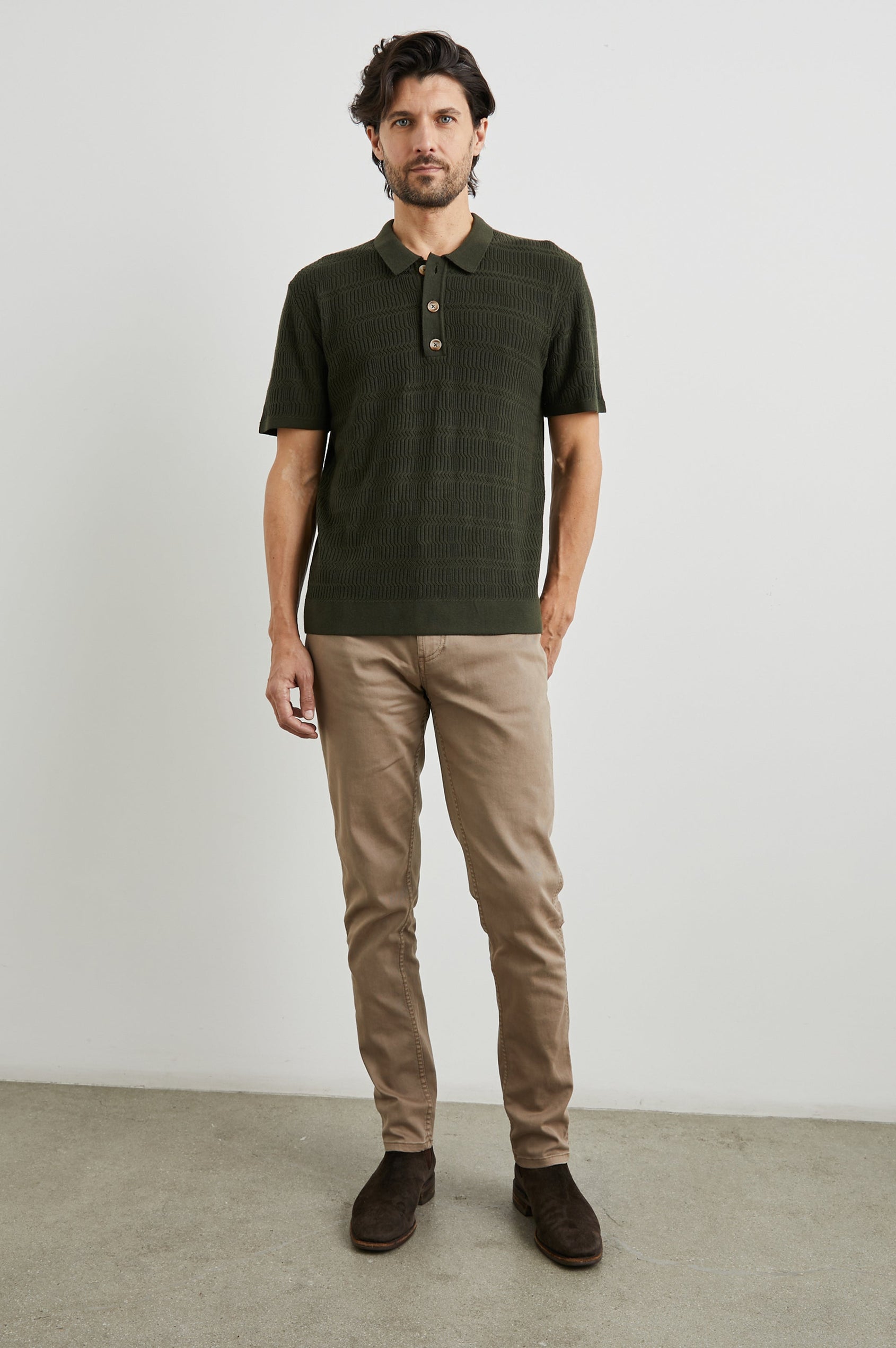 Nathan Short-Sleeve Polo Shirt with a Three-Button Placket and a Jacquard Pattern in Ancient Olive Colorway - Front Full Body View Featured on Model