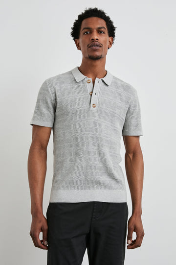 Nathan Short-Sleeve Polo Shirt with a Three-Button Placket and a Jacquard Pattern in Concrete Melange Colorway - Front View Featured on Model