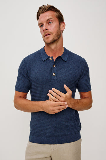 Nathan Polo Shirt in Cotton Blend Knit With Collar, Quarter Button Placket, and Short Sleeves in Harbour Colorway - Upper Body Front Close Up View Featured on Model