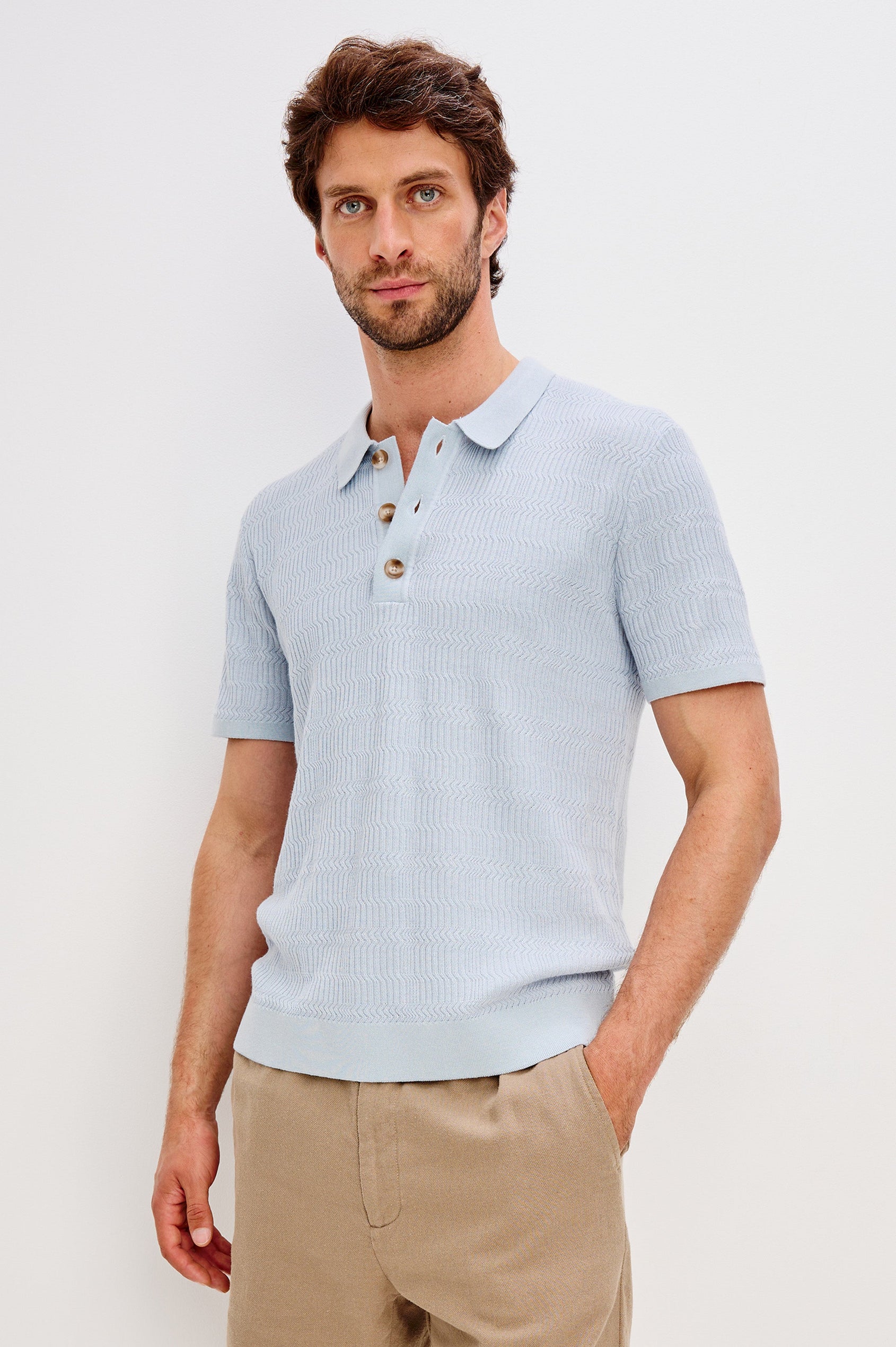 Nathan Short-Sleeve Polo Shirt with a Three-Button Placket and a Jacquard Pattern in Skyway Colorway - Front View Featured on Model