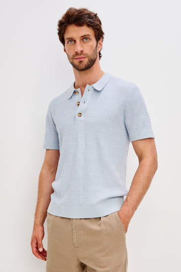 Nathan Short-Sleeve Polo Shirt with a Three-Button Placket and a Jacquard Pattern in Skyway Colorway - Front View Featured on Model