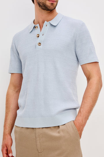 Nathan Short-Sleeve Polo Shirt with a Three-Button Placket and a Jacquard Pattern in Skyway Colorway - Front Detail View Featured on Model