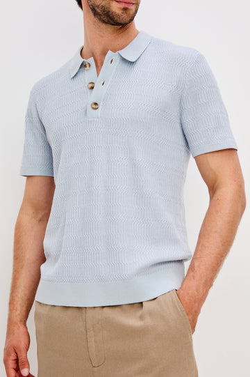 Nathan Short-Sleeve Polo Shirt with a Three-Button Placket and a Jacquard Pattern in Skyway Colorway - Front Detail View Featured on Model