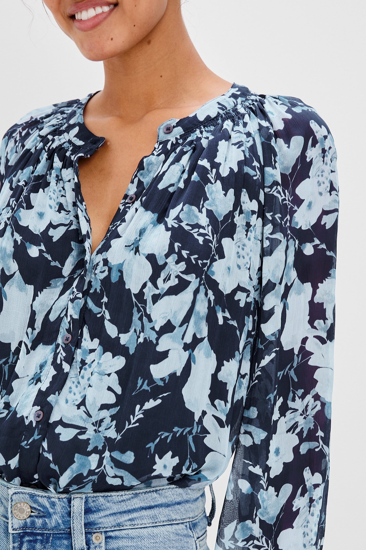 Nessie Long Sleeve Top with Front Button Closure and Ruching along the Neckline in Indigo Blossoms Colorway, Flowers in Blue on Indigo - Front Tucked View Featured on Model 
