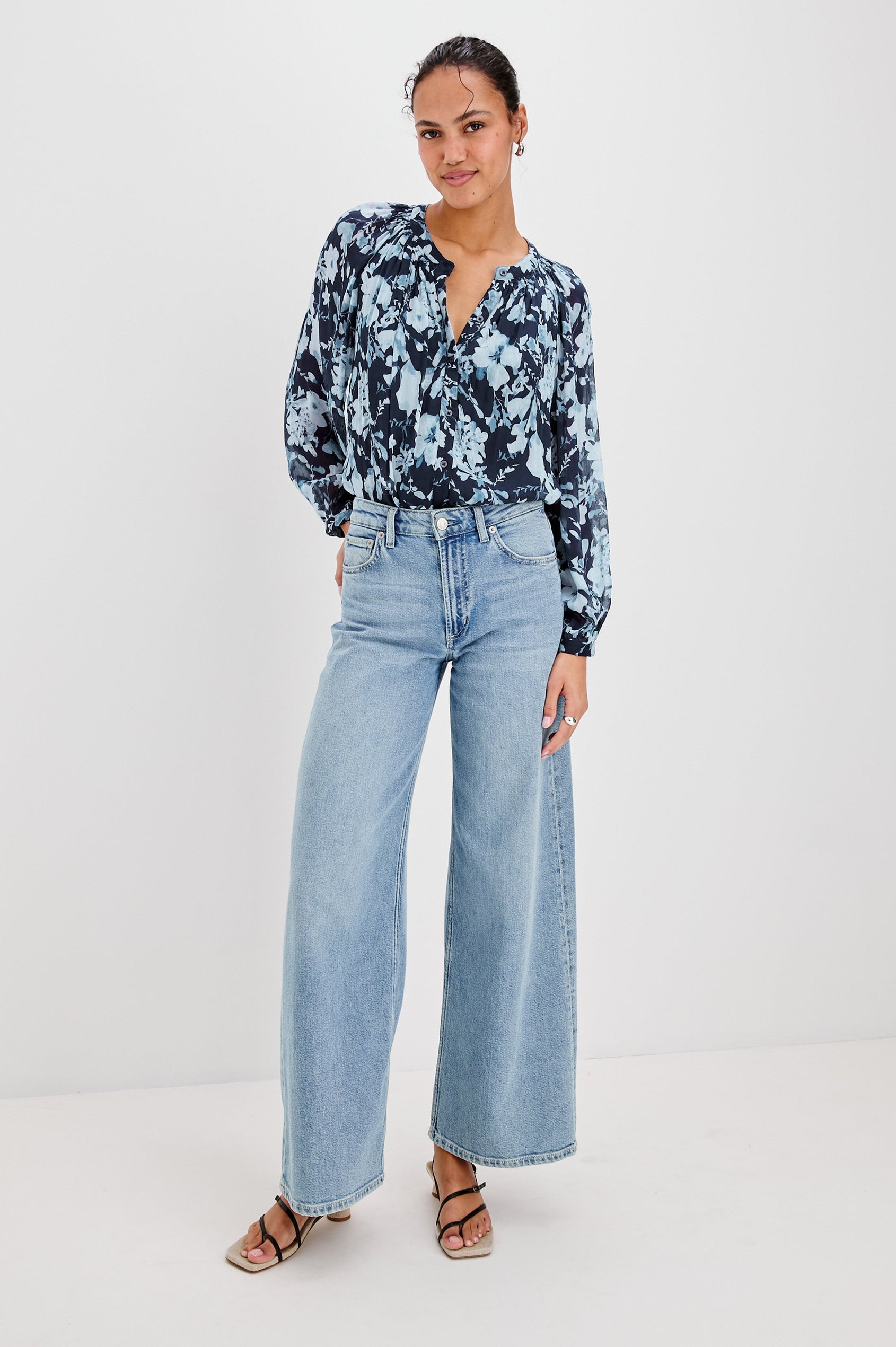 Nessie Long Sleeve Top with Front Button Closure and Ruching along the Neckline in Indigo Blossoms Colorway, Flowers in Blue on Indigo - Front Full Body View Featured on Model 